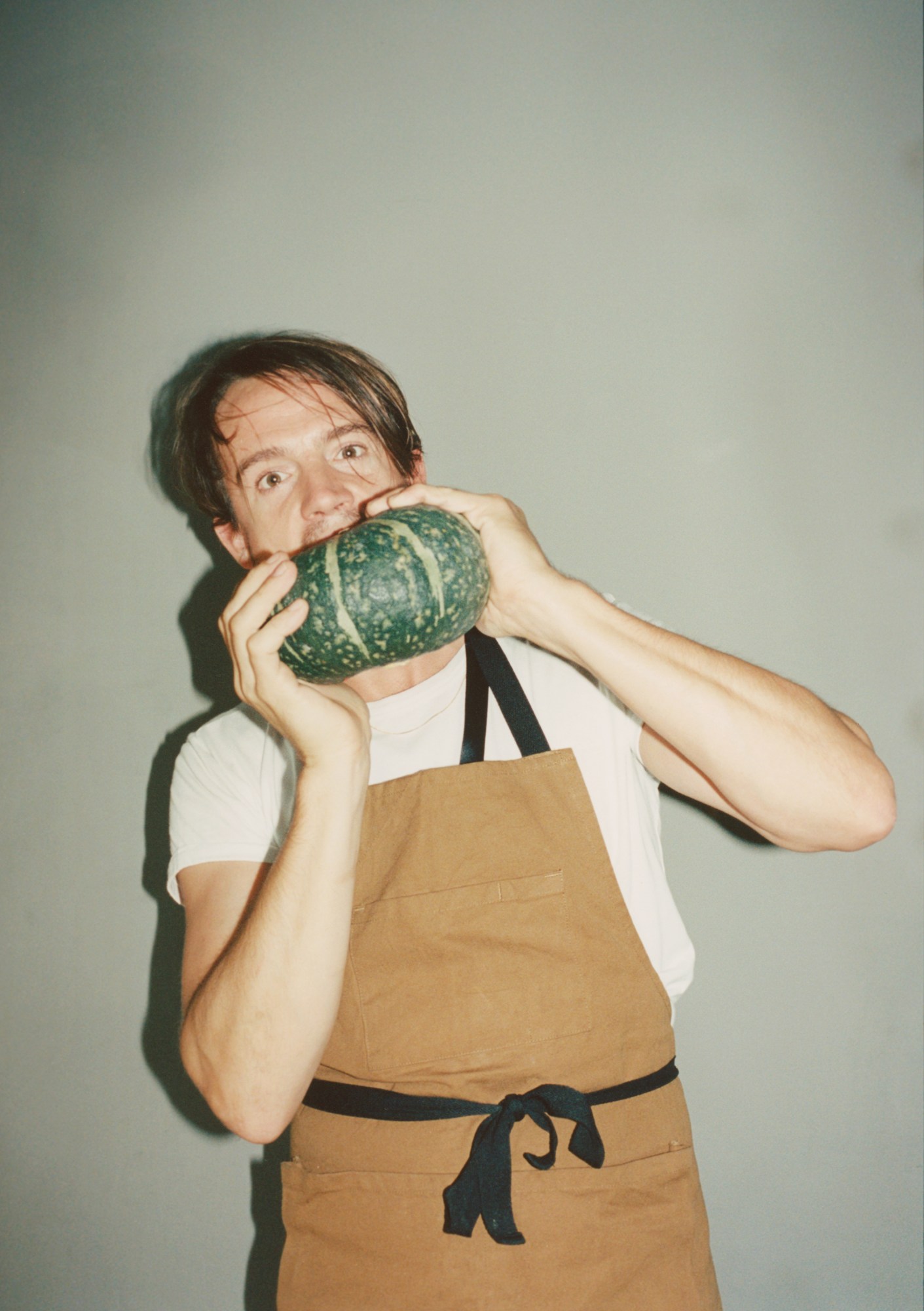Johnnie Collins eating a squash, chef at London Fashion Week