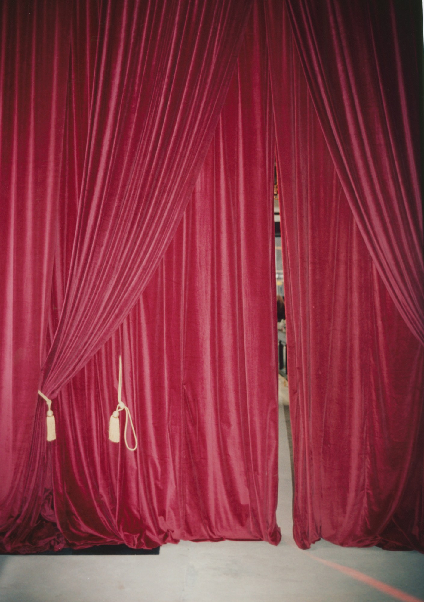Red velvet curtains behind the scenes at London Fashion Week