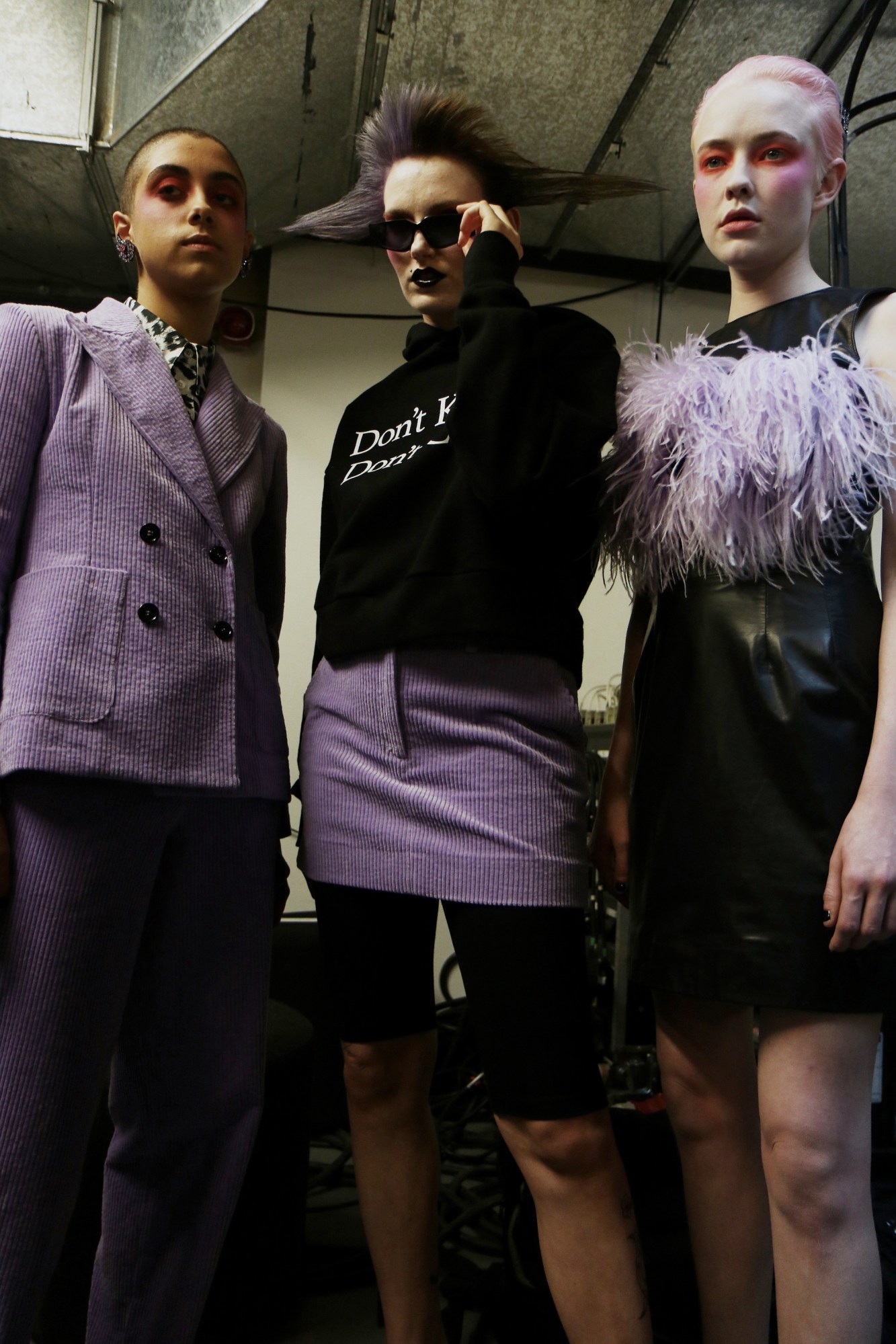 Purple cord and feathers at London Fashion Week