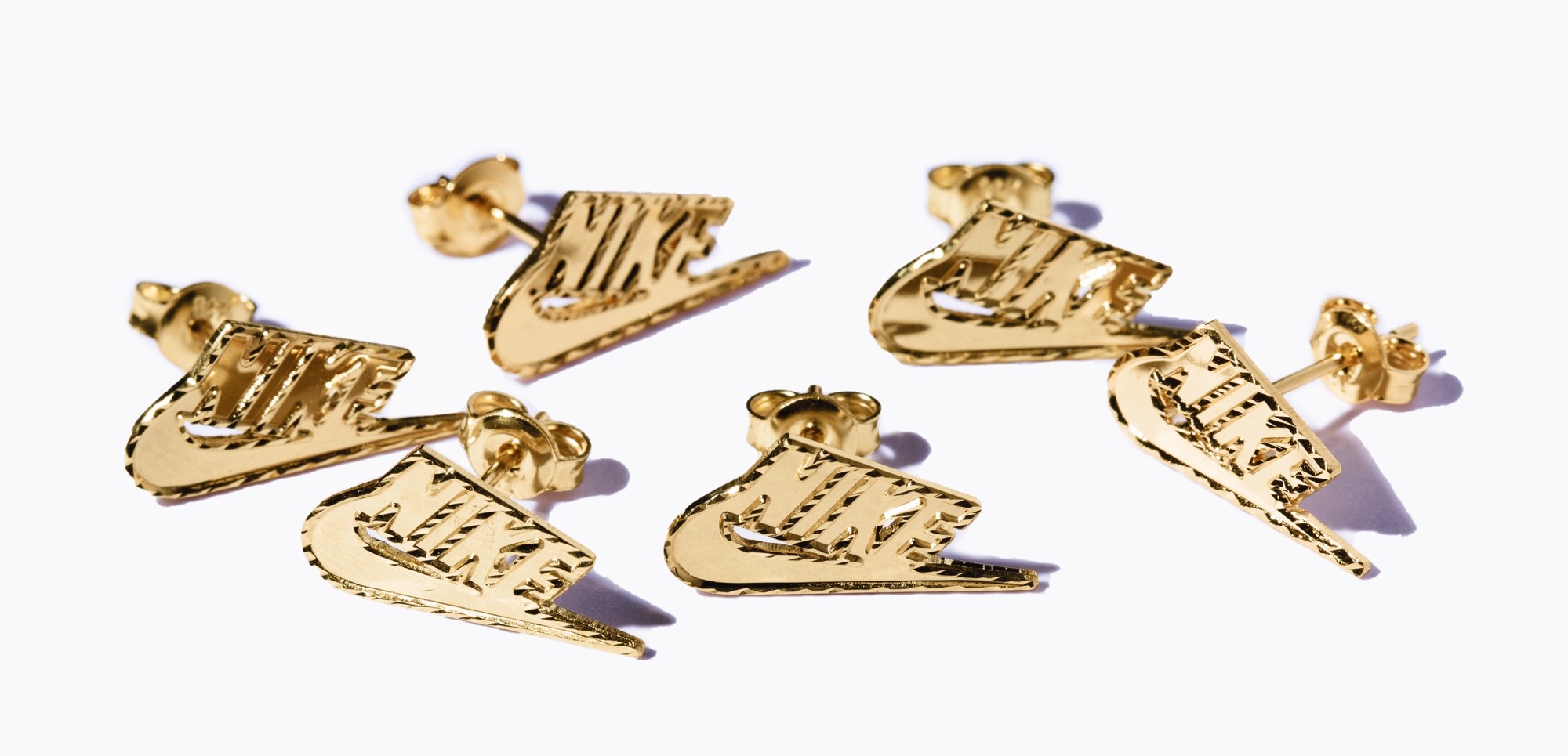 Supreme x Nike collaboration preview pictures - gold earring