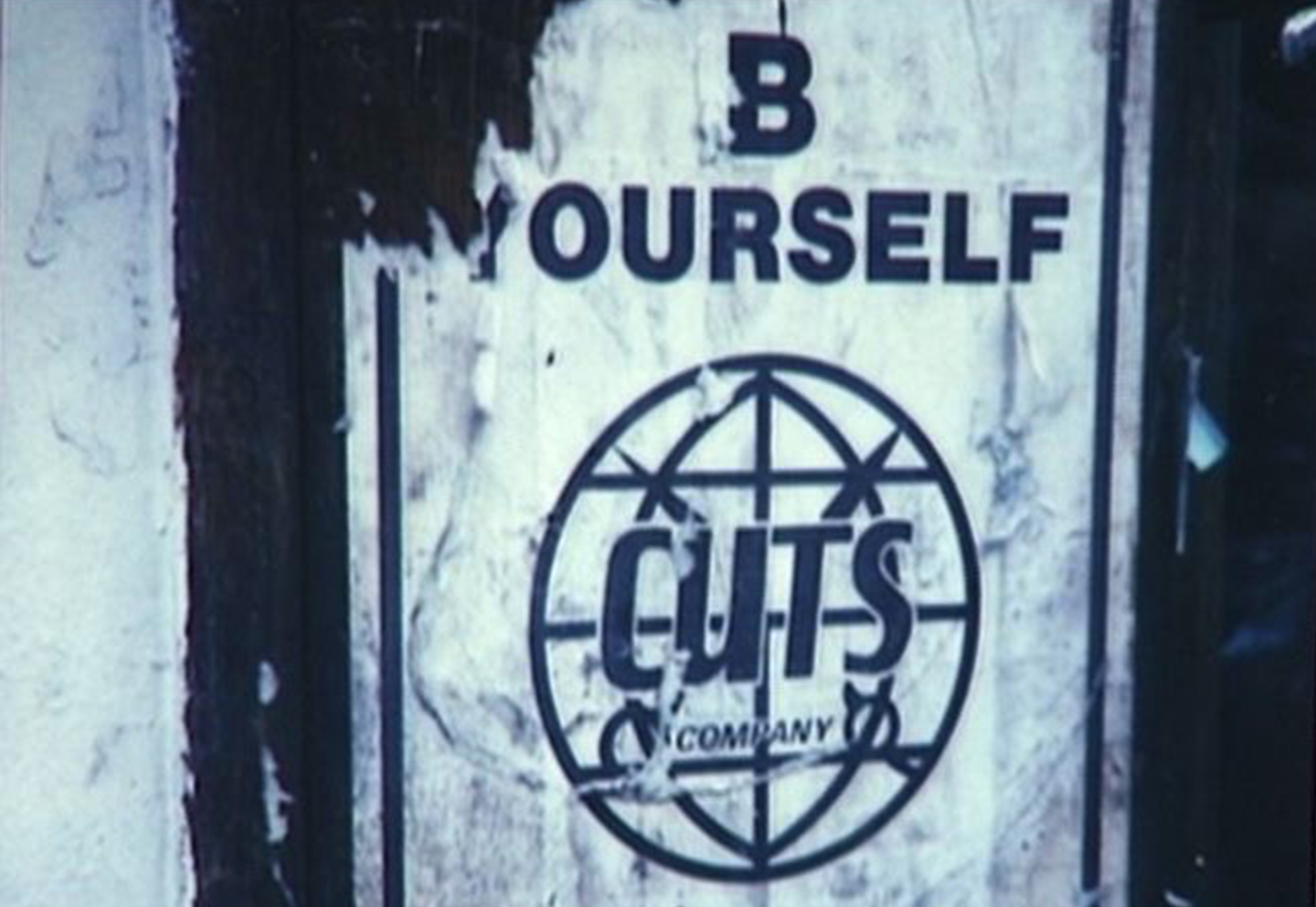 poster outside cult London salon Cuts in the 1980s