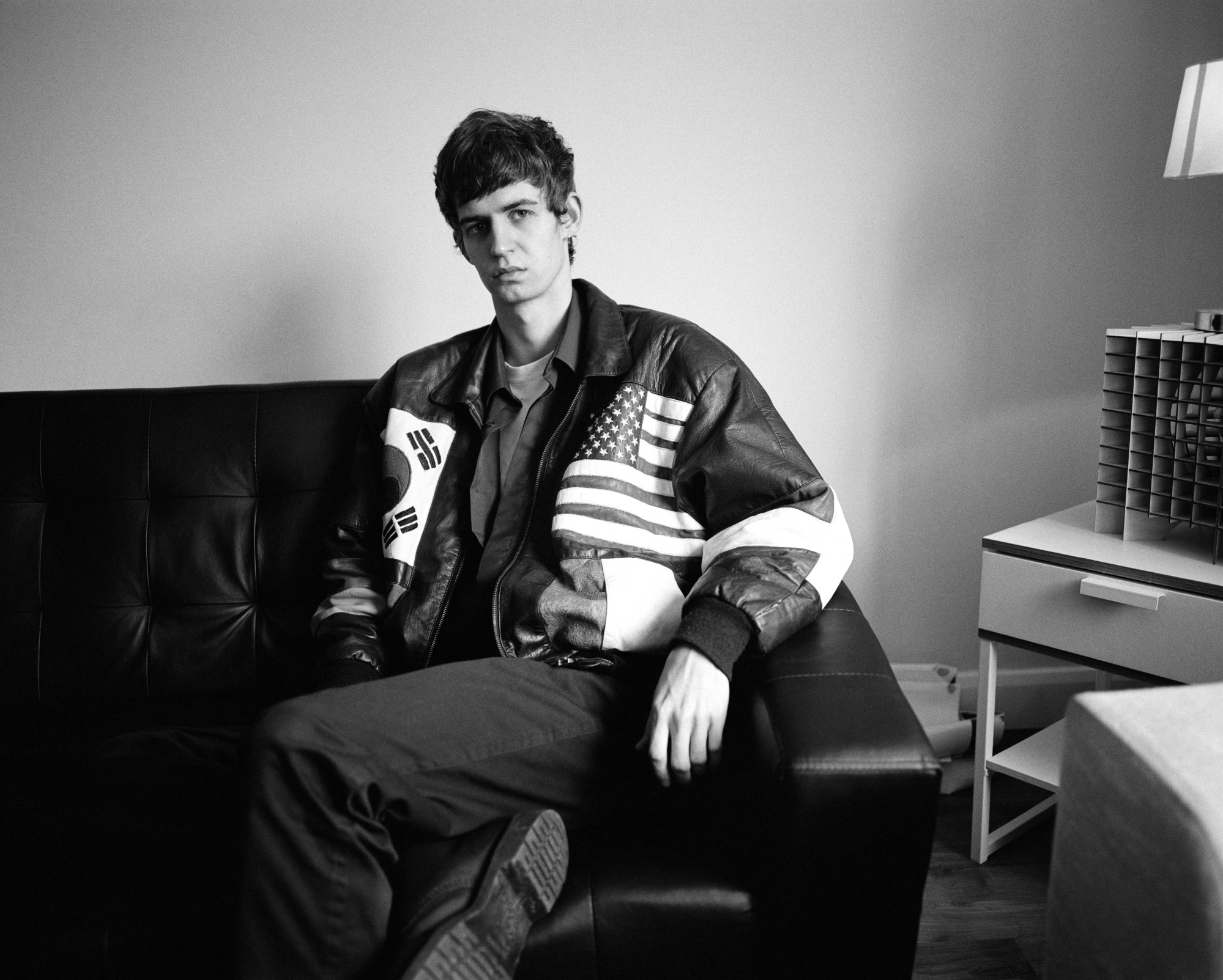 Male model relaxing on the sofa