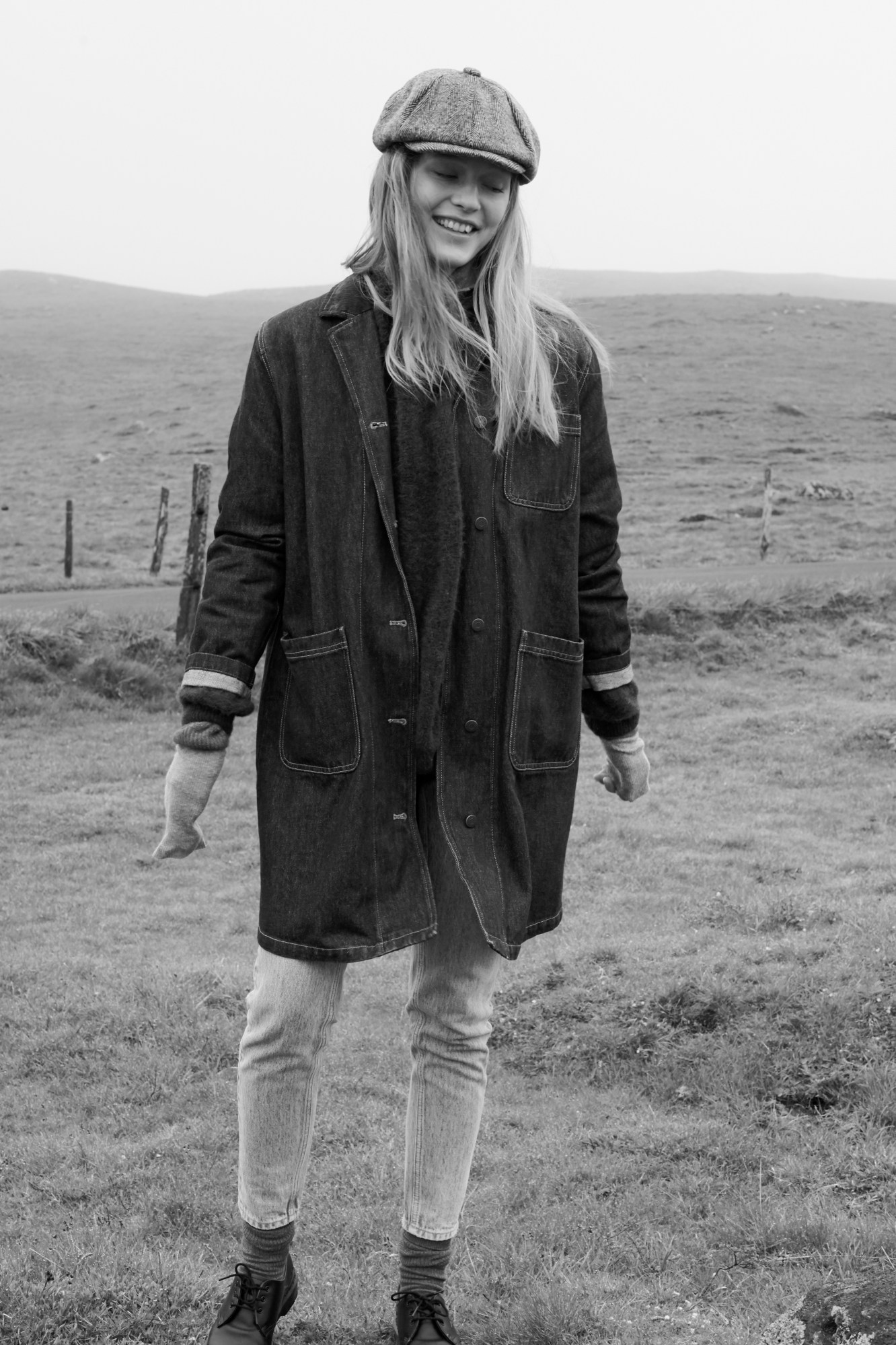 Woman in American Vintage campaign in field.