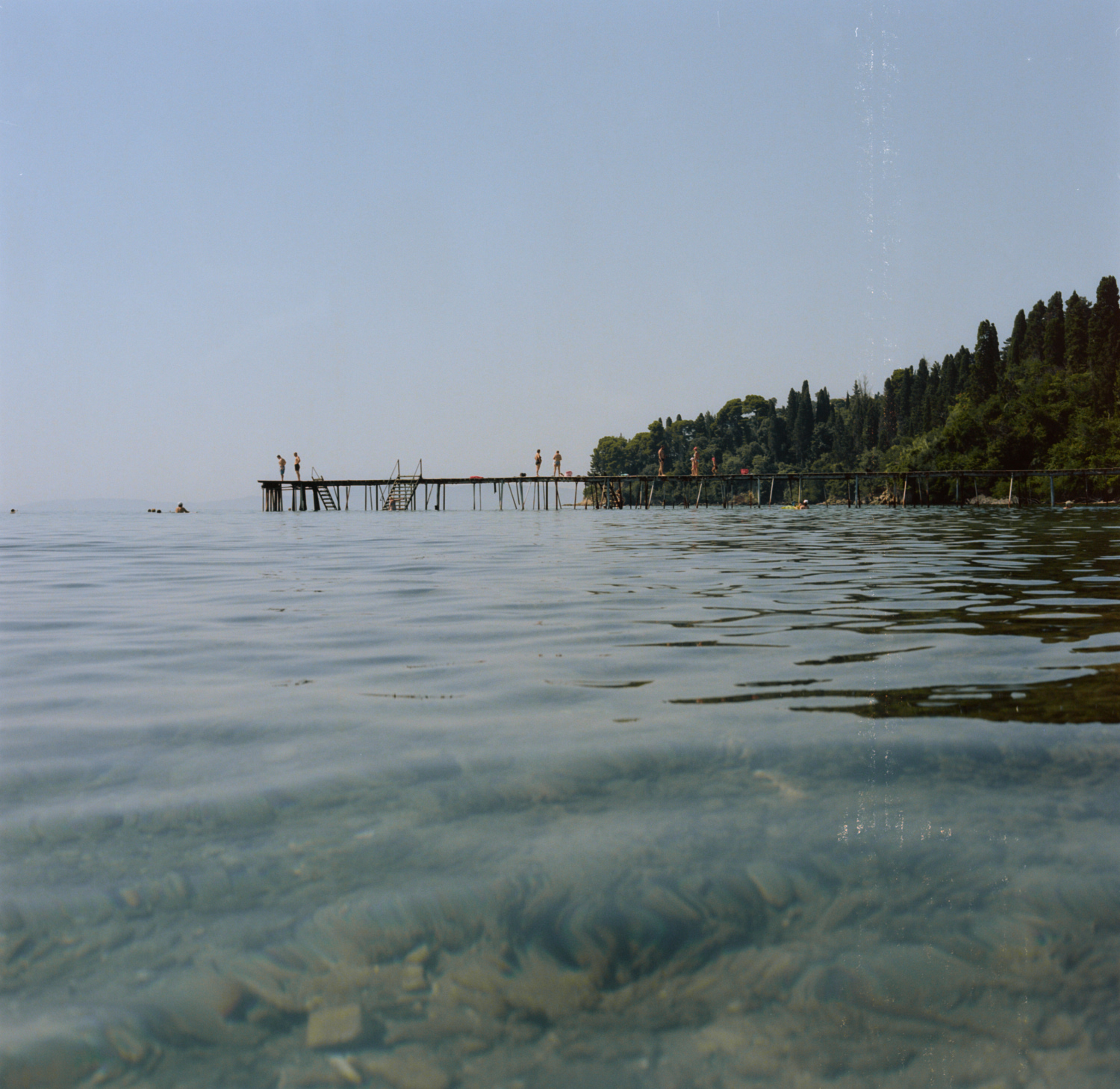 yann faucher photographs a pier in greece