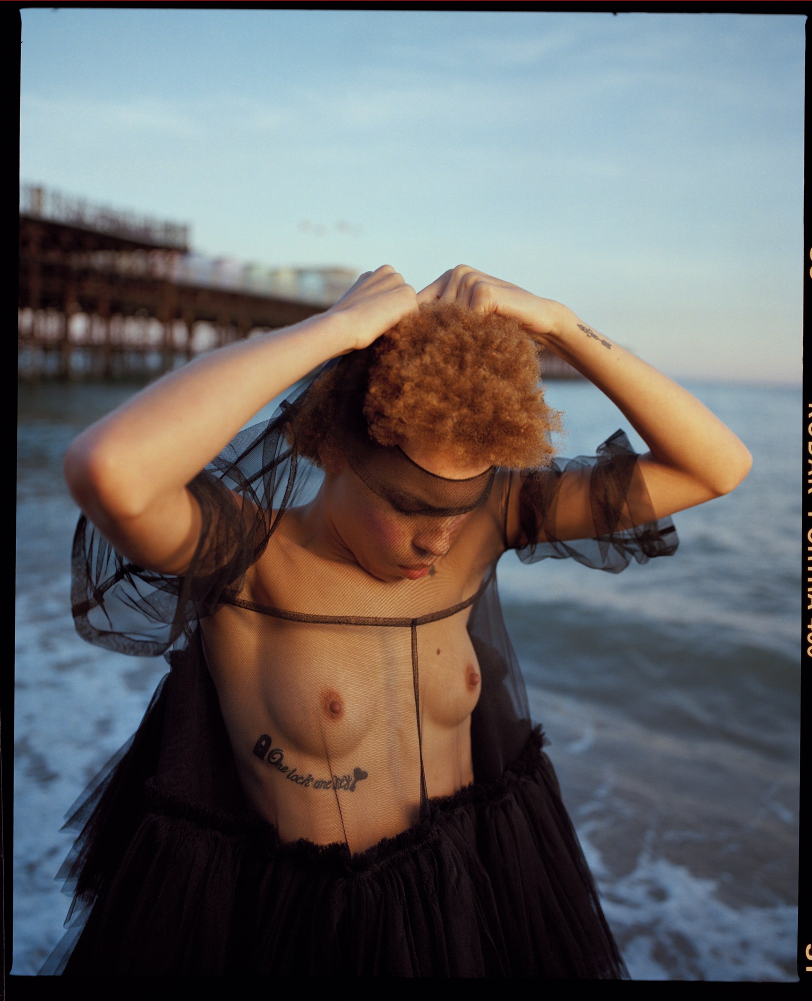 nadine ijewere photographs model by the sea