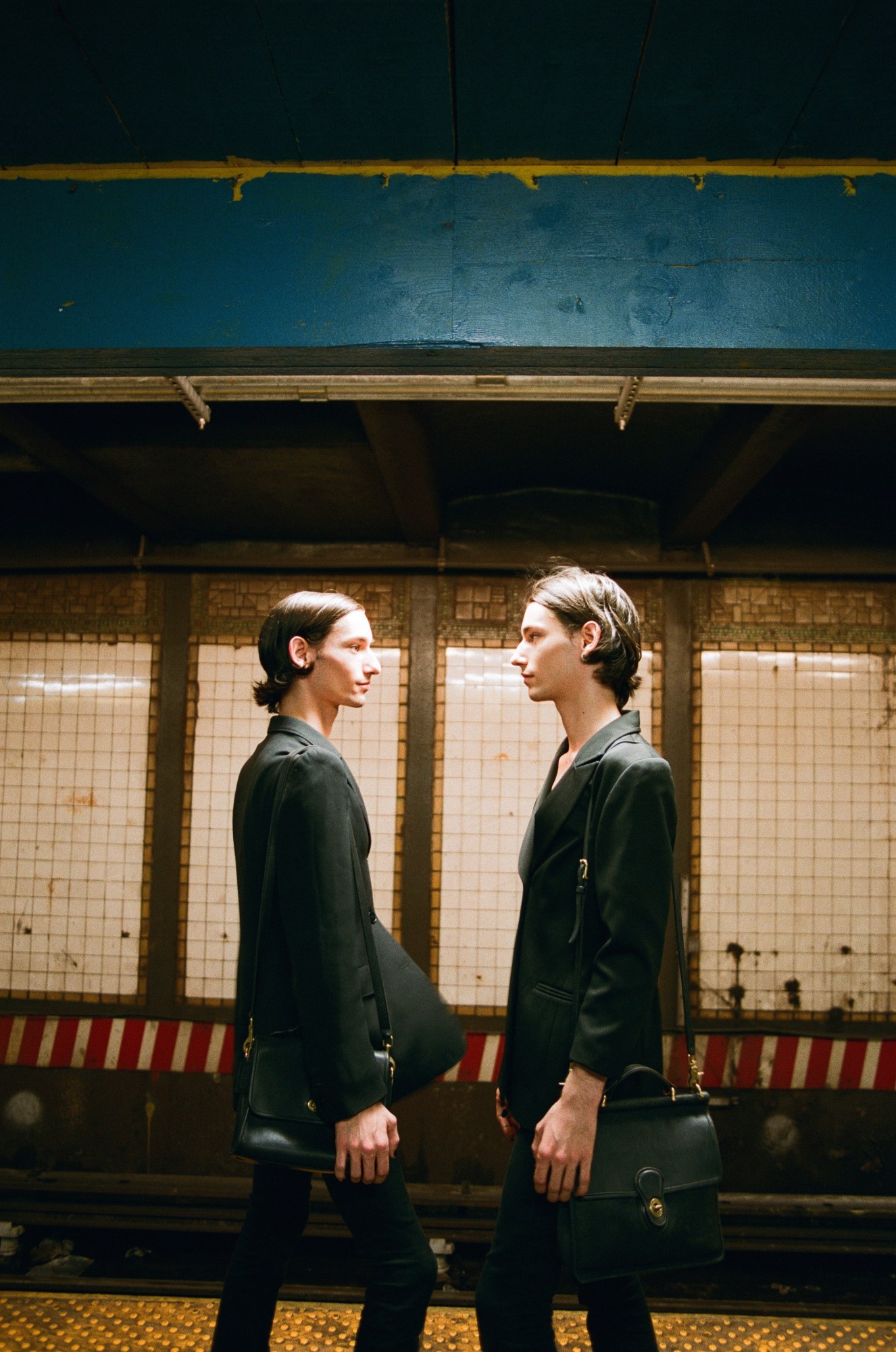 TWINS on the subway photographed by sabrina santiago