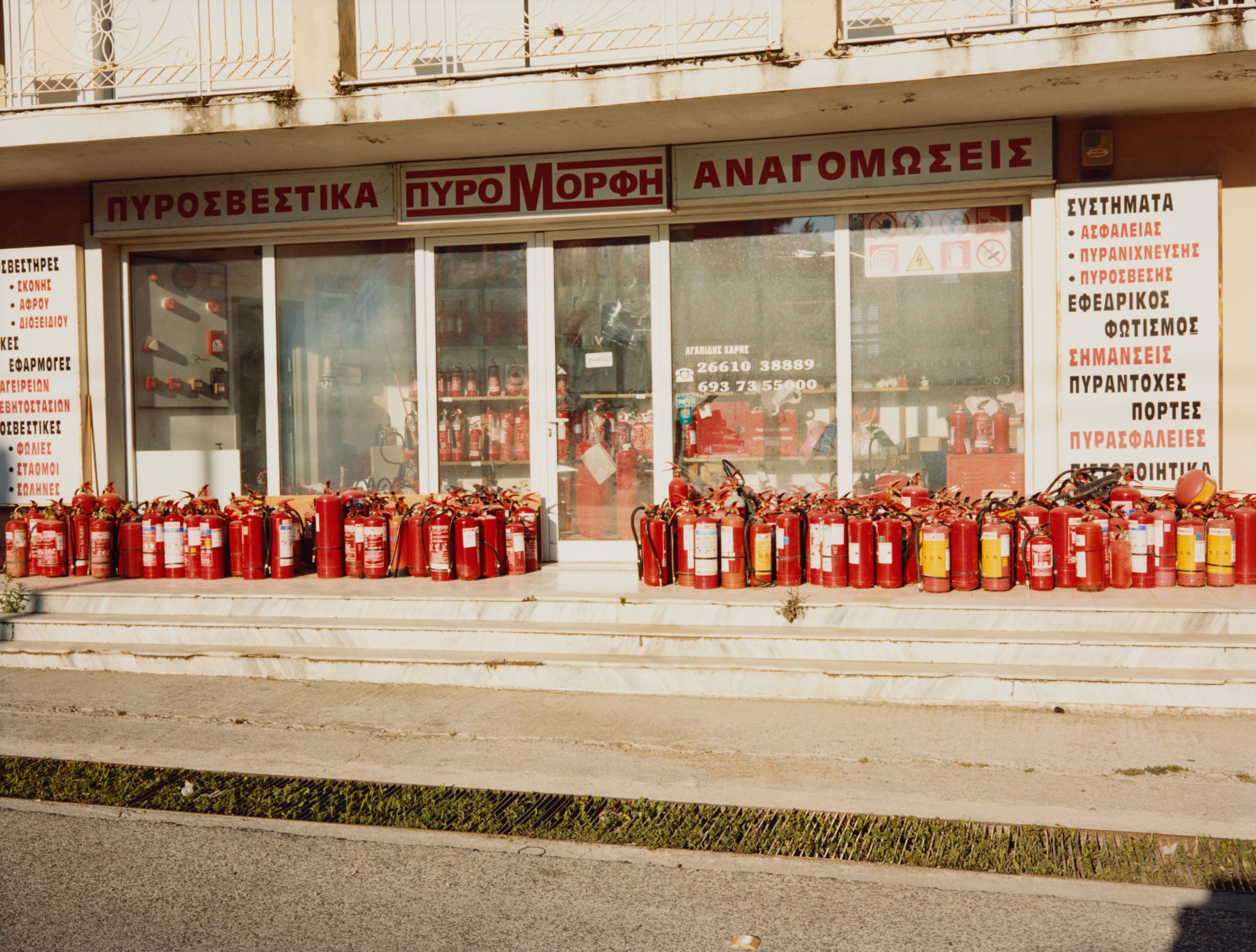 maxwell tomlinson photographs a shop in corfu