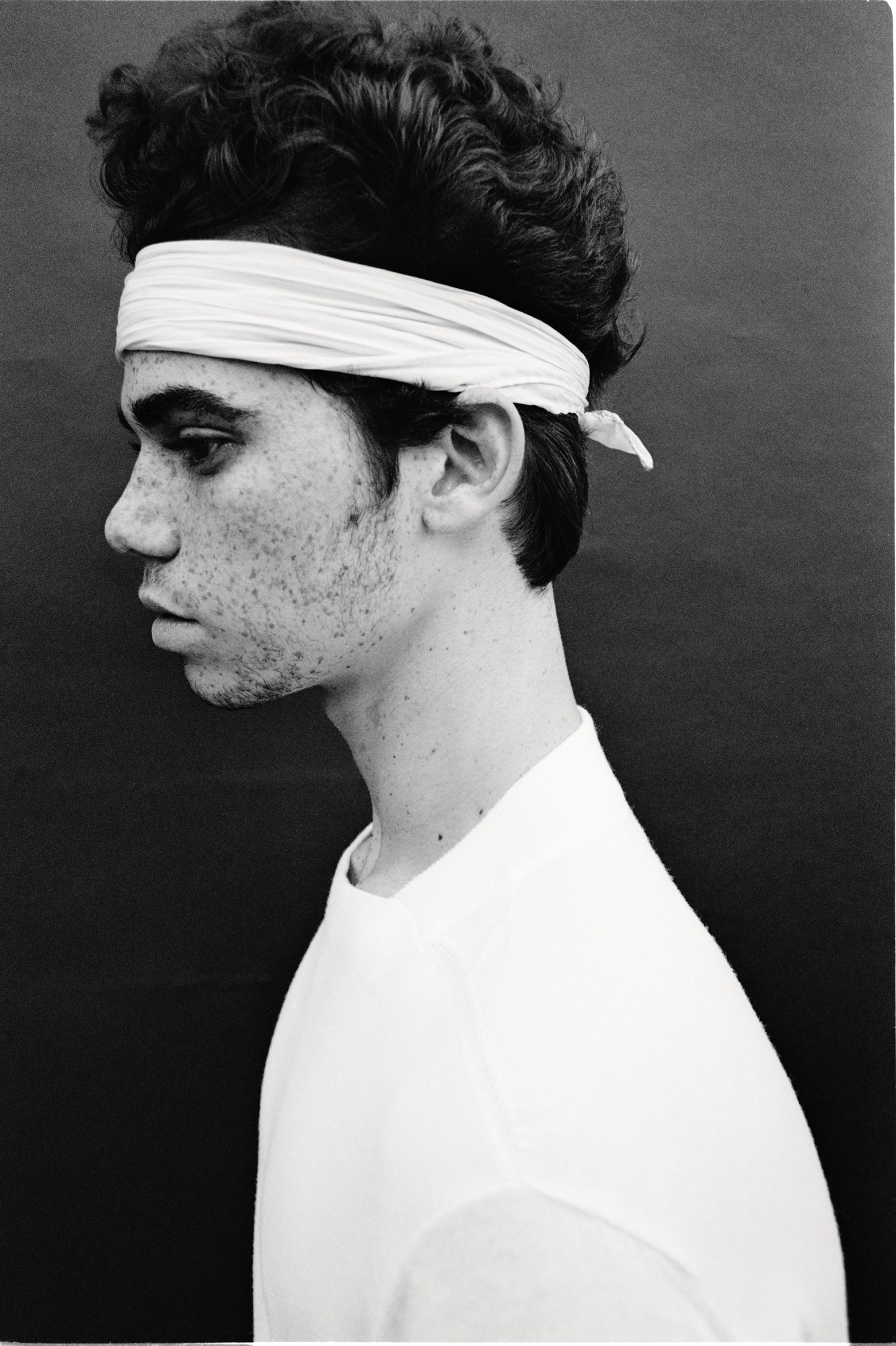 CAMERON BOYCE in los angeles wearing a head tie