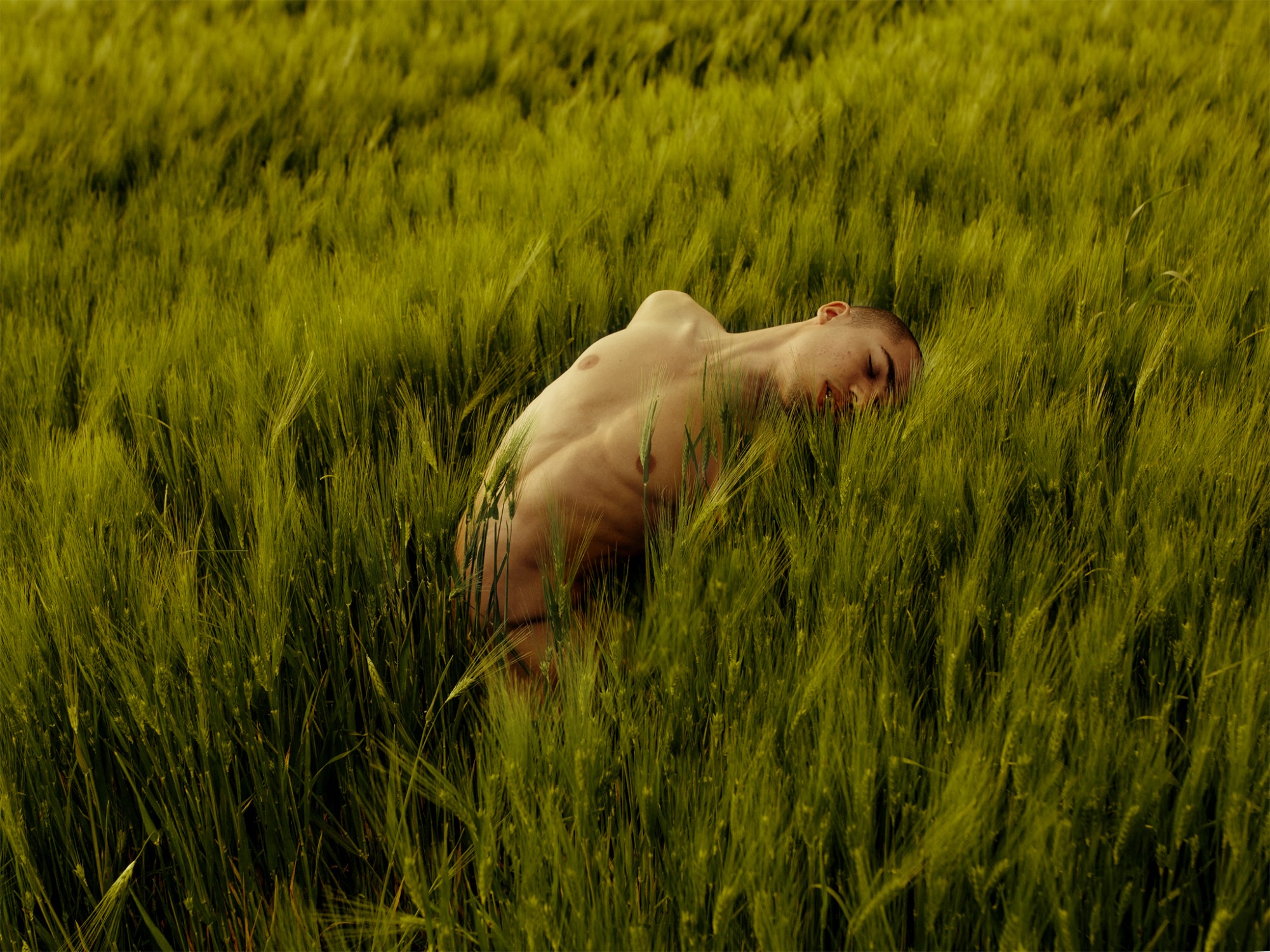 david uzochukwu naked in a field