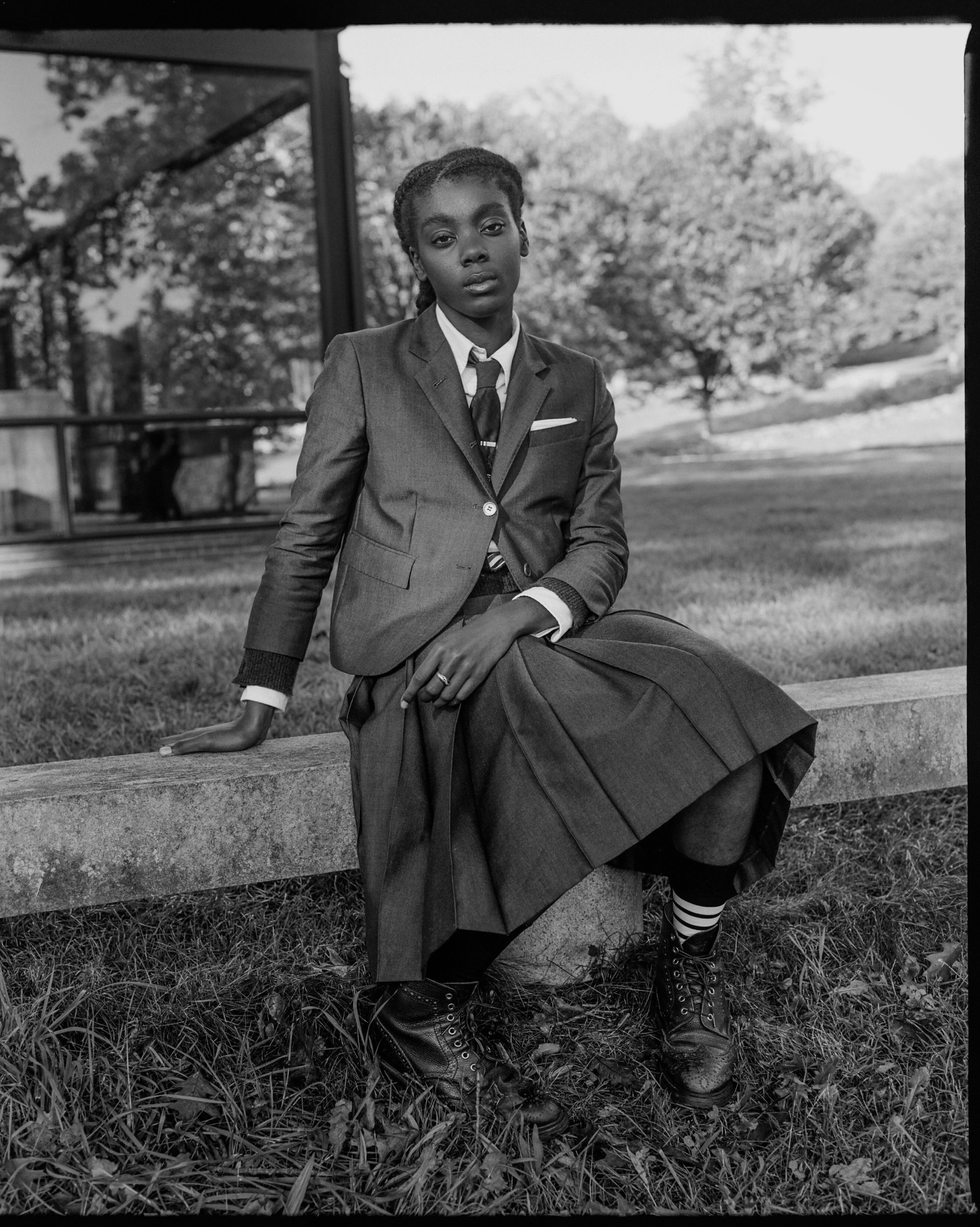 a girl in uniform sat down