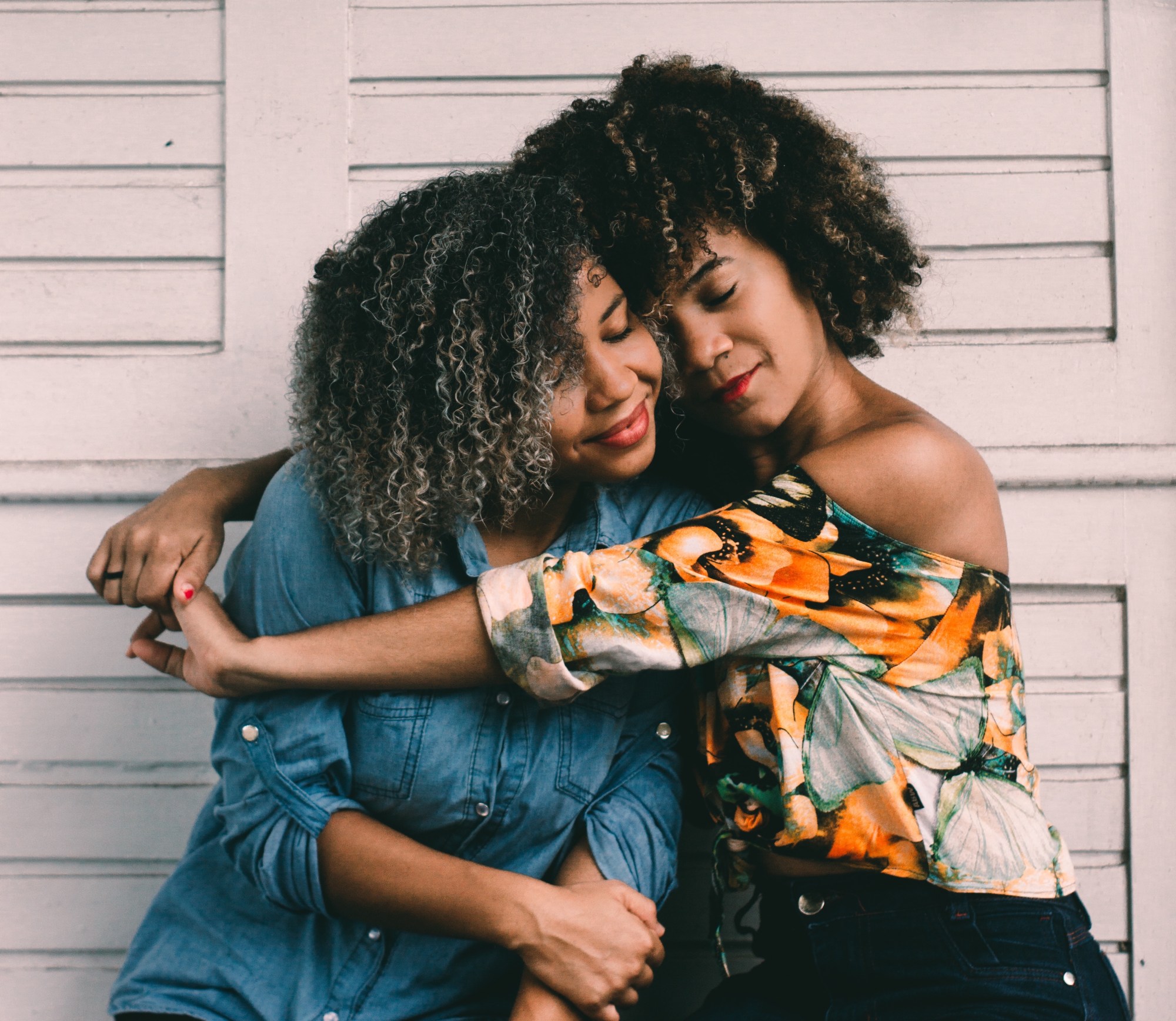 Female friends hugging each other