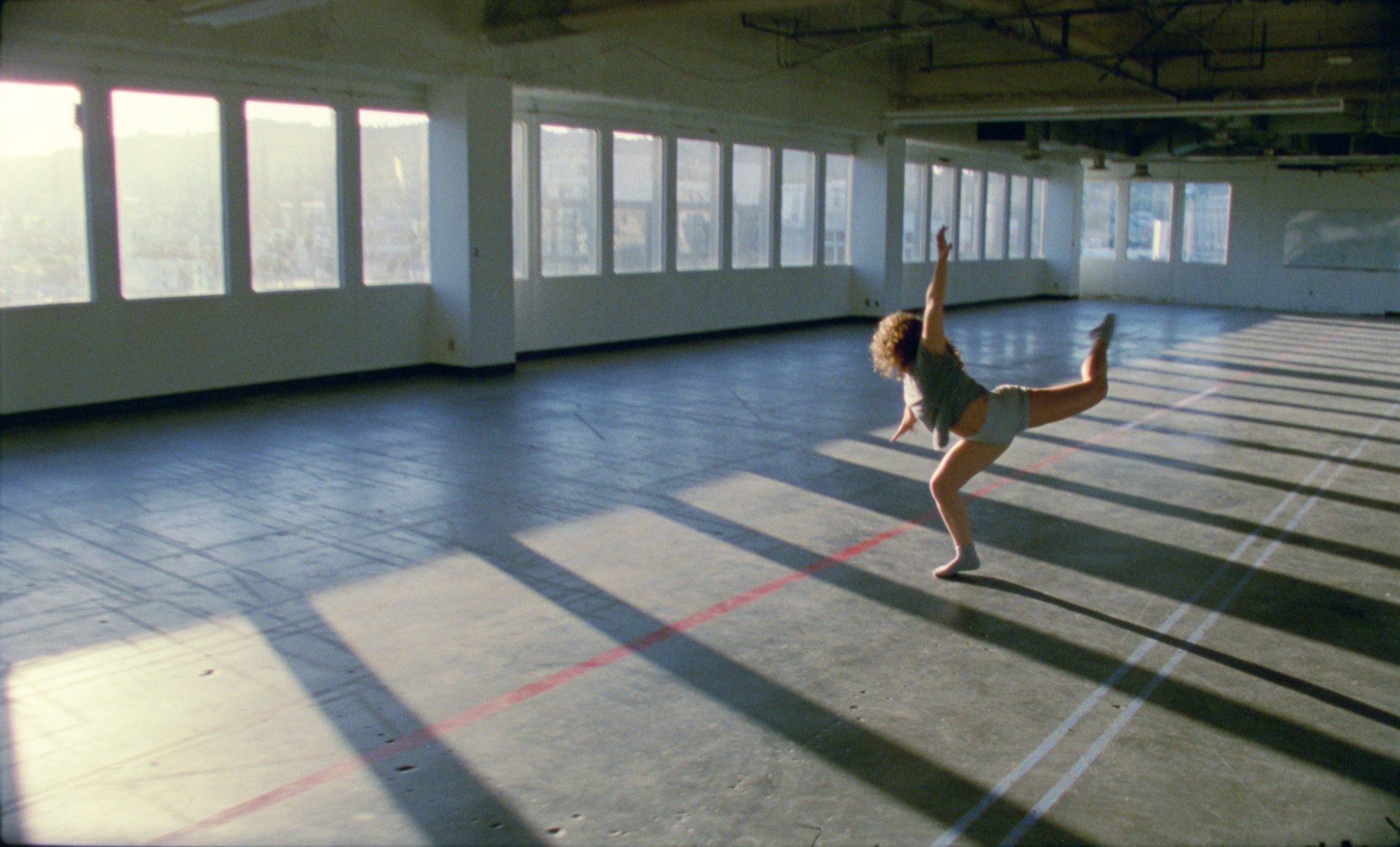 Film still of dancer Caribay Franke in PLANETARIUM directed by Liv Colliander and David Henry Gerson.