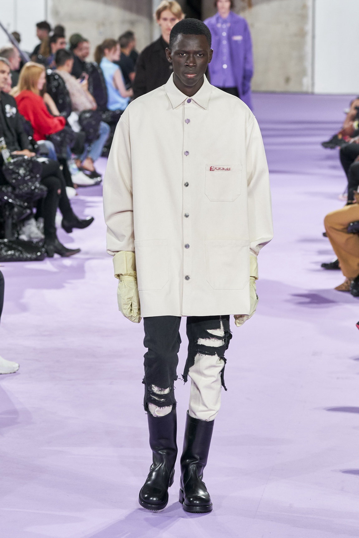 without saying a word, raf simons takes sartorial aim at corporate