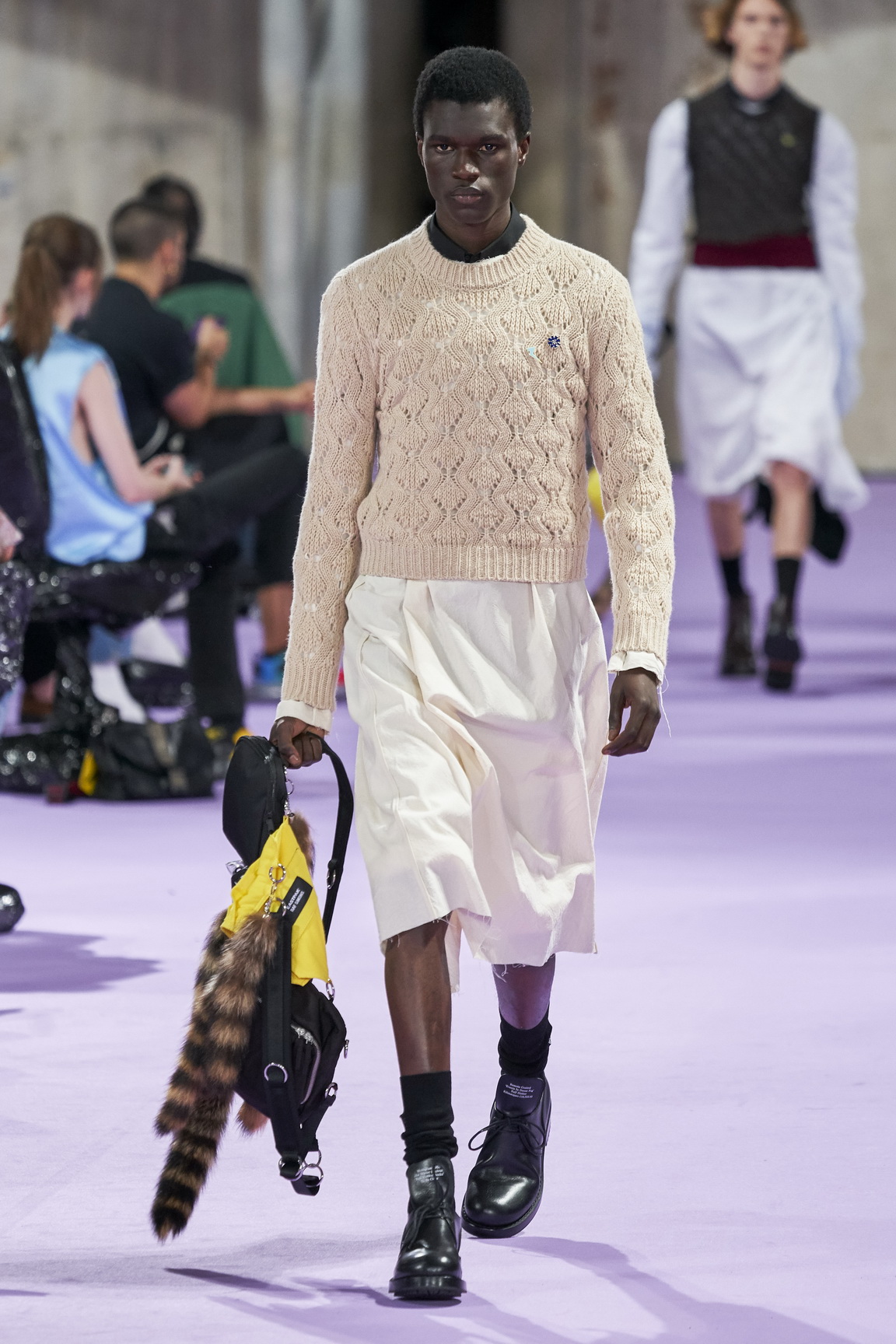 without saying a word, raf simons takes sartorial aim at corporate