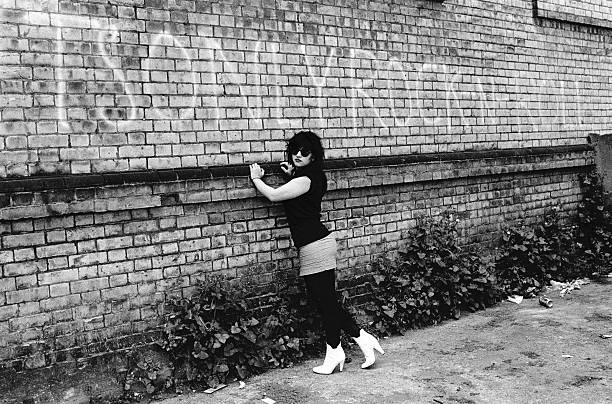 1563553349084-Lydia-Lunch-Brick-Wall-Getty-_-Janette-Beckman