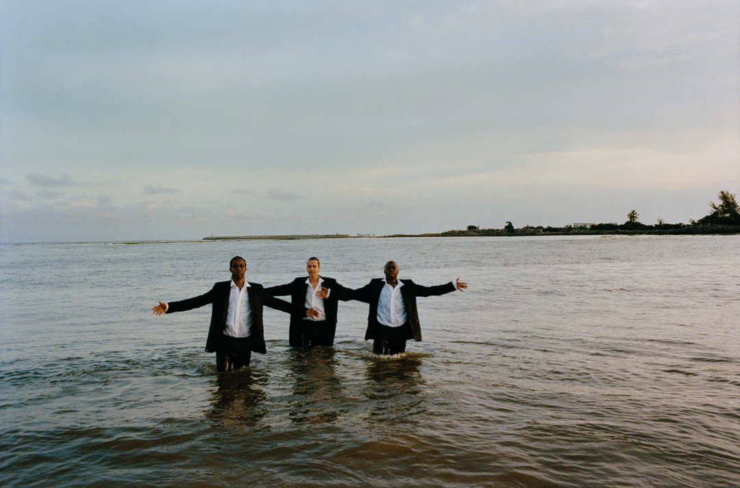 Three men in water