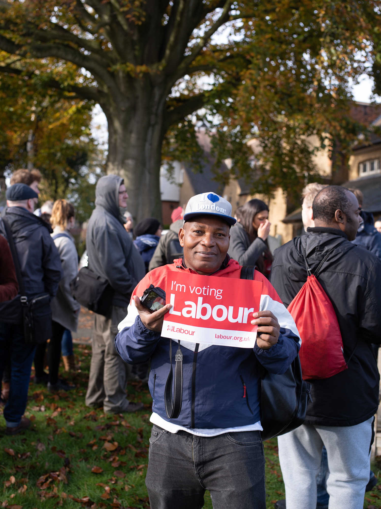 Labour campaigner holding sign