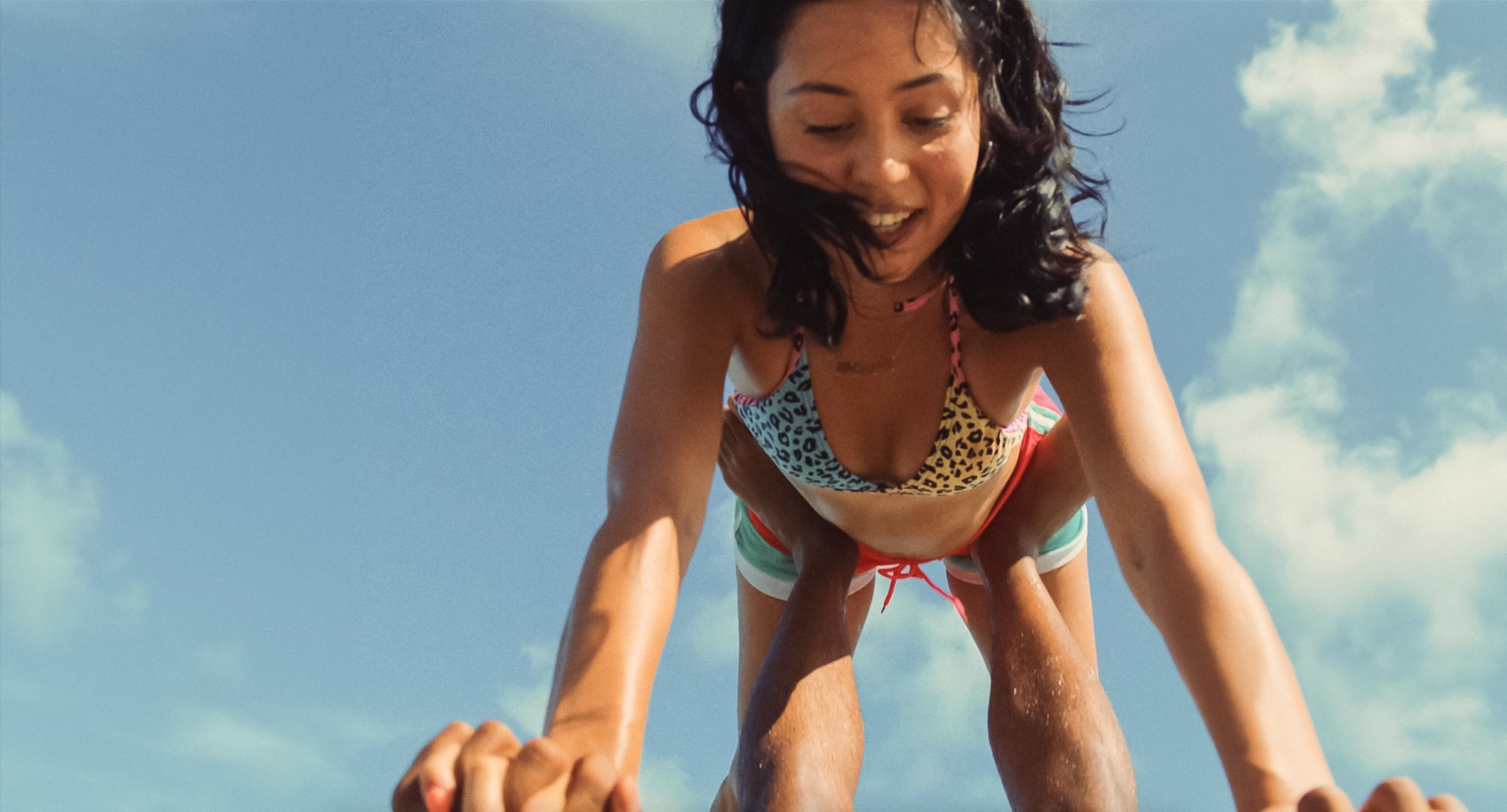 Alexa Demie on the beach in the film Waves