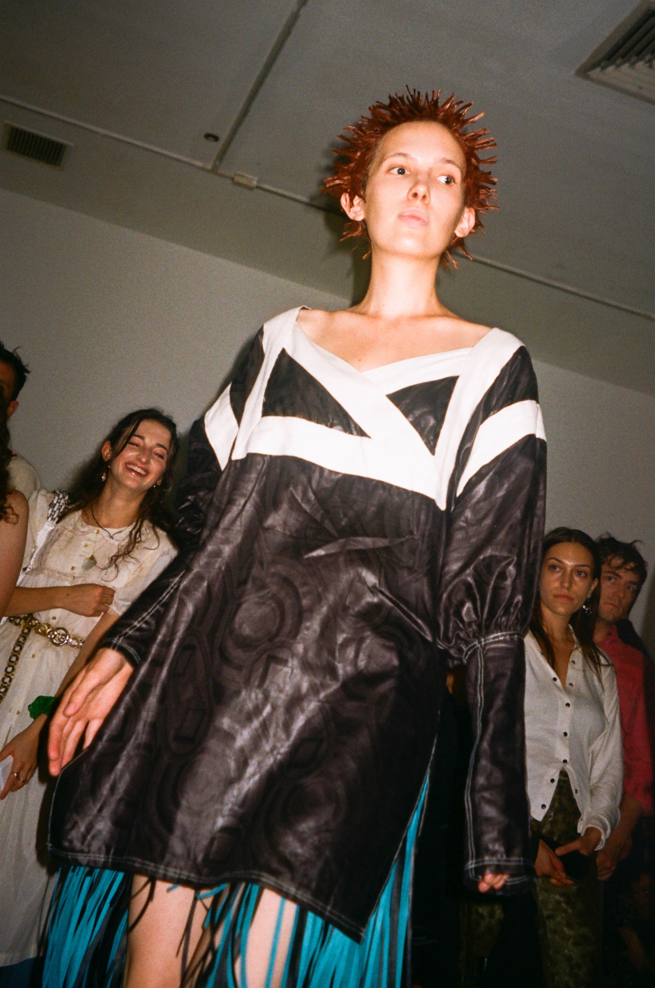 A model walks in the SC103 fashion show