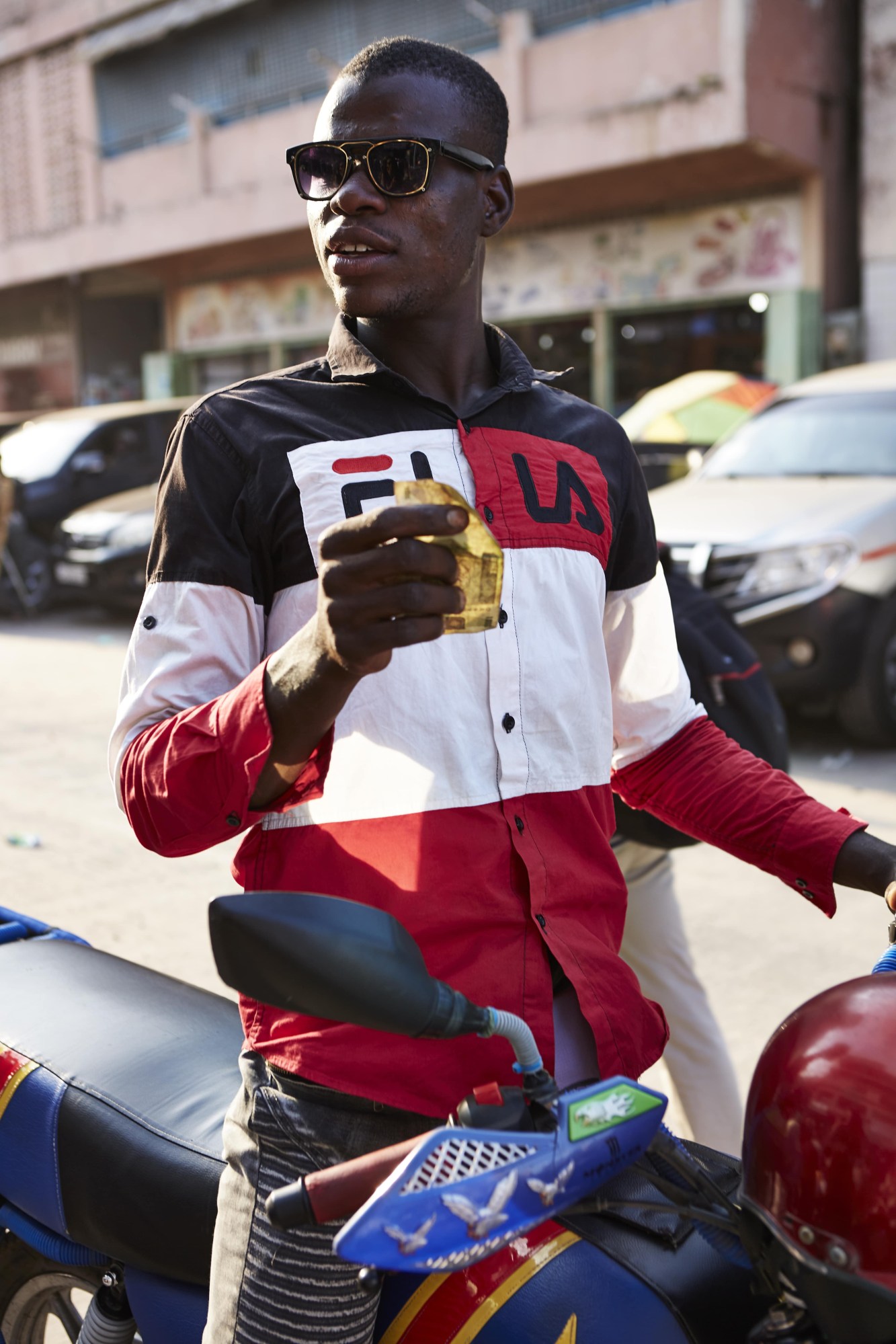 kinshasha congo motorcycle taxi rider street style