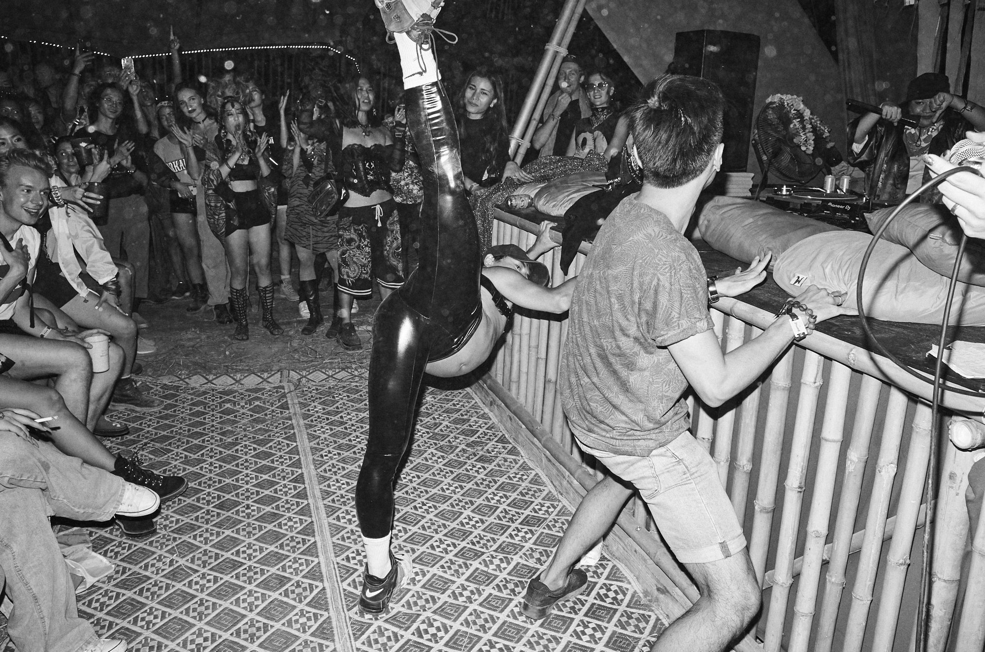 crowd scene from 'god save the queer' stage at wonderfruit festival, thailand