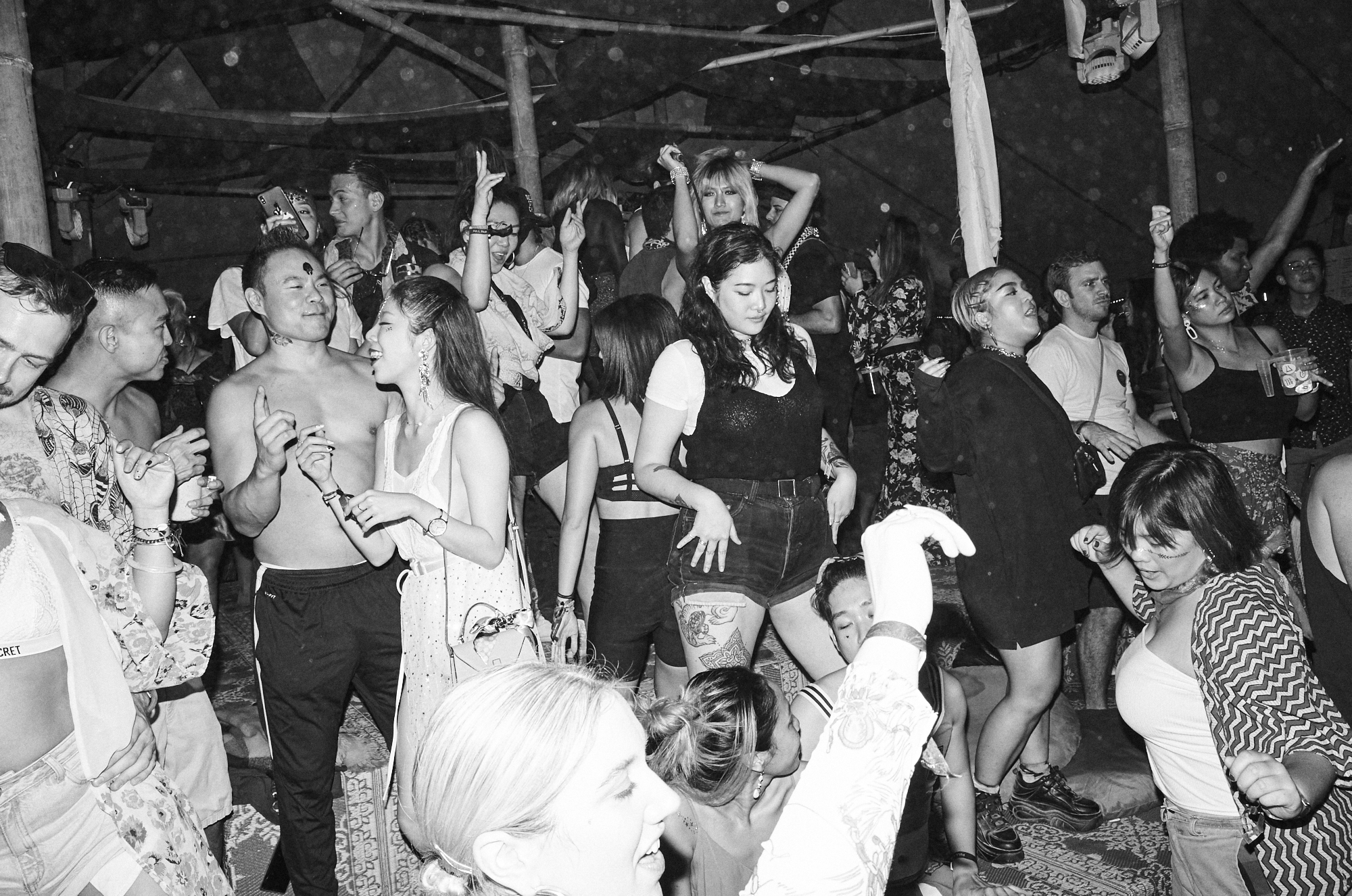 crowd scene from 'god save the queer' stage at wonderfruit festival, thailand