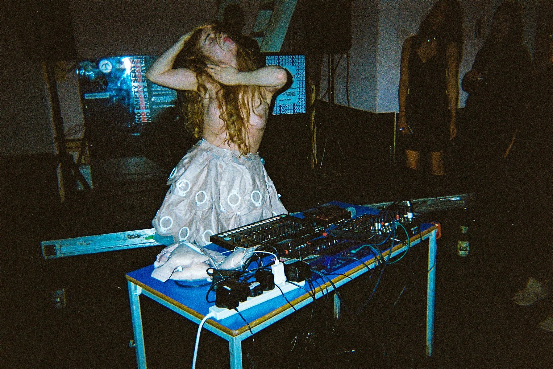 topless girl djing a party