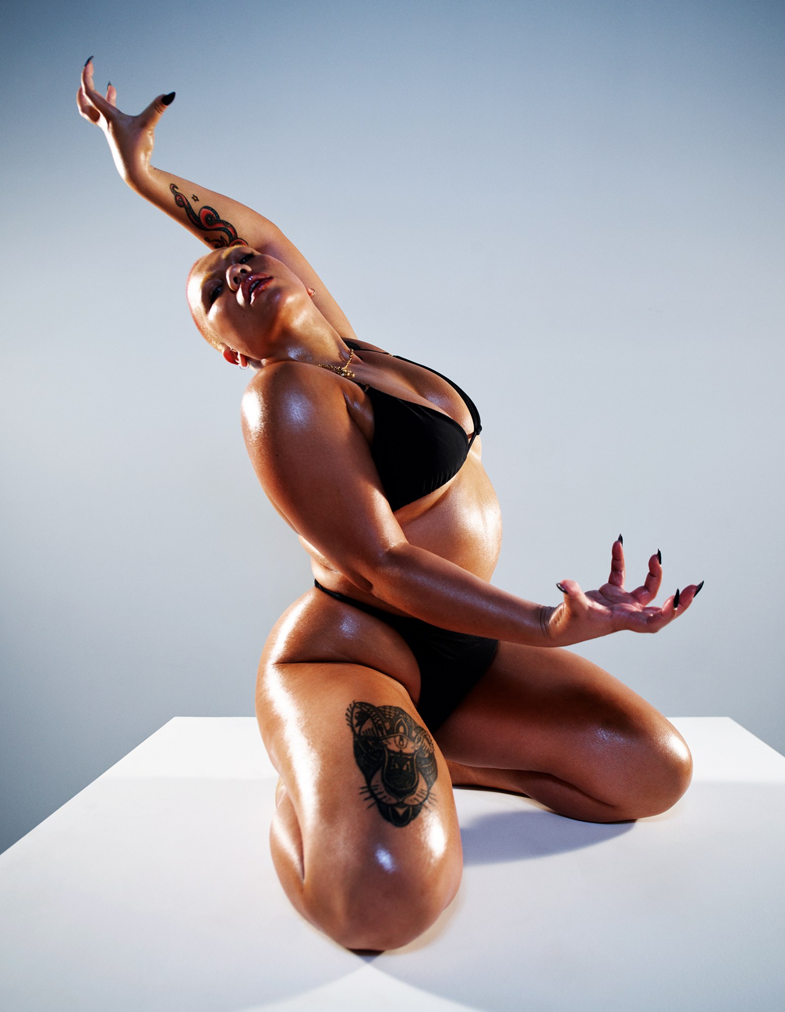 choreographer parris goebel posing in swimwear