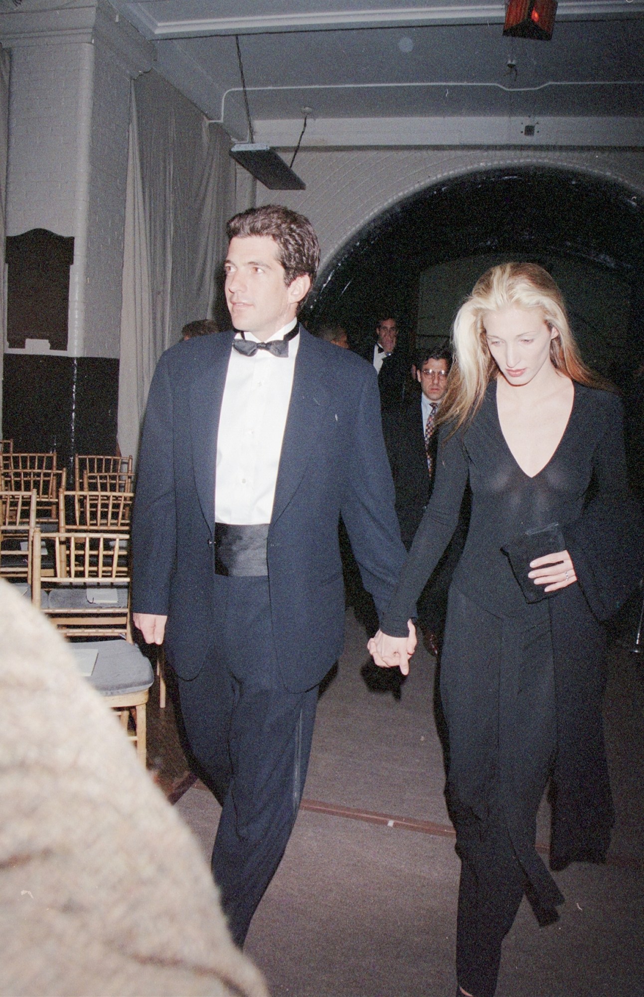 carolyn bessette-kennedy and john f. kennedy jr. walking and holding hands