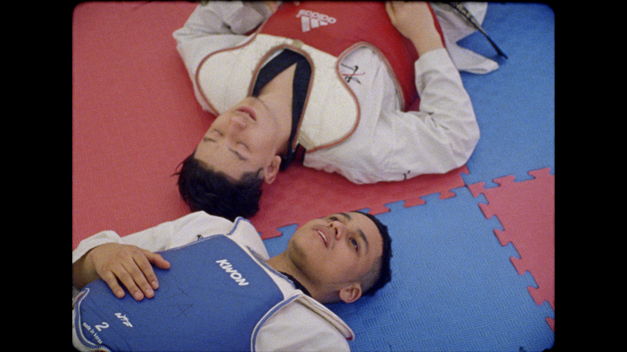 latino boys on taekwondo mat