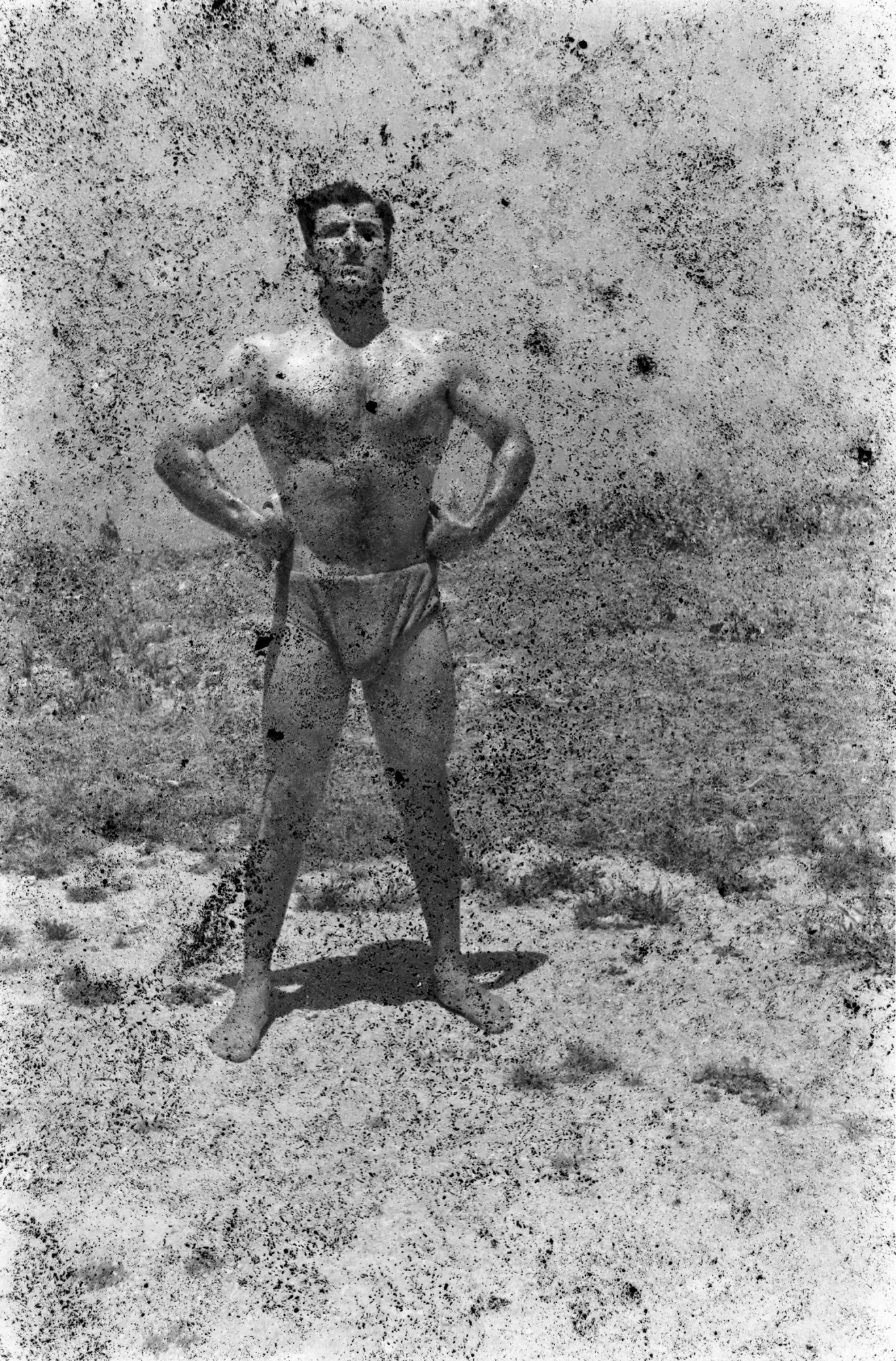 Akram Zaatari, Bodybuilders, Printed From A Damaged Negative Showing Mahmoud El Dimassy In Saida, 1948, 2011 From the archive of Studio Shehrazade / Hashem el Madani © Akram Zaatari. Courtesy the artist, Thomas Dane Gallery and Sfeir Semler Gallery.