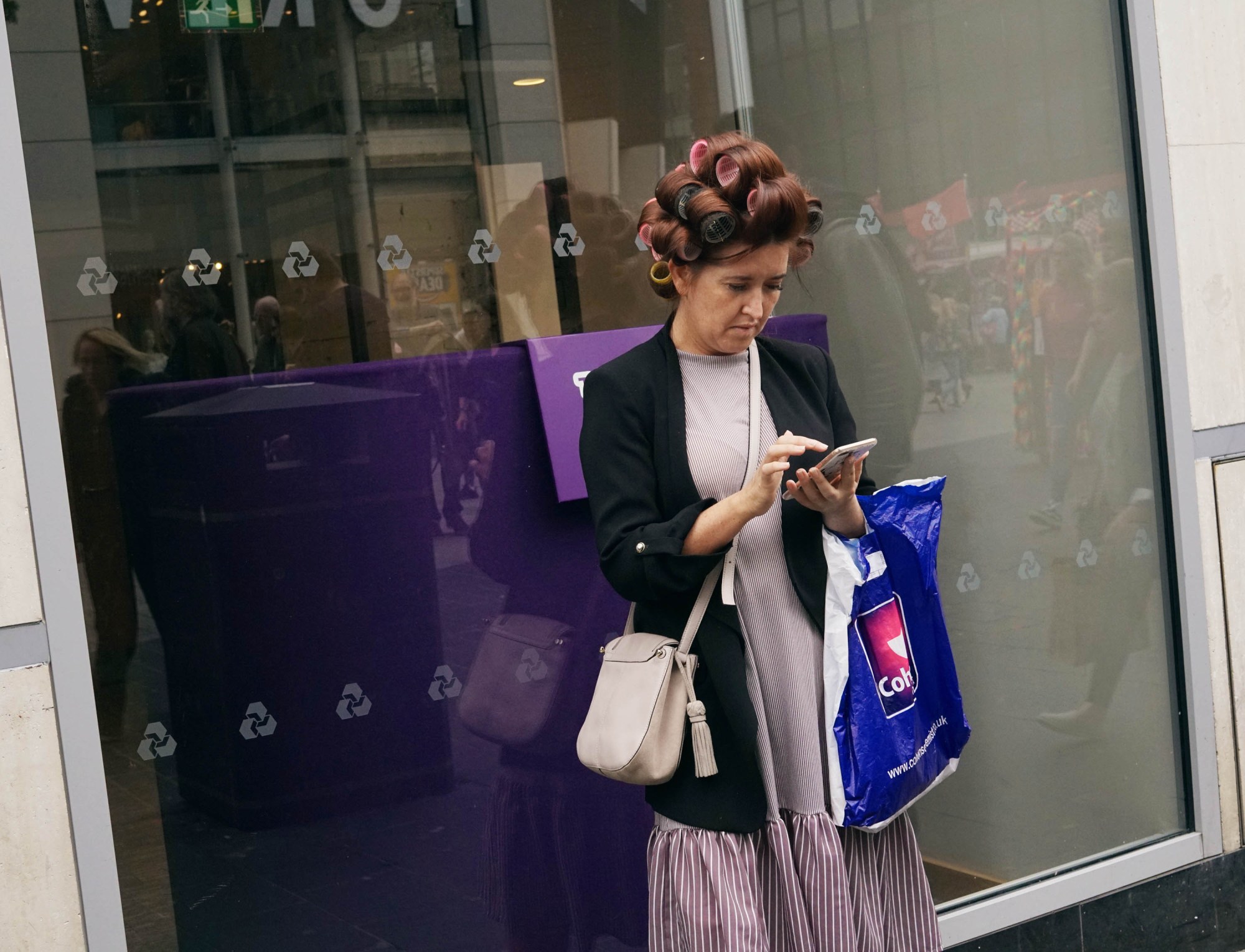 woman with rollers in her hair