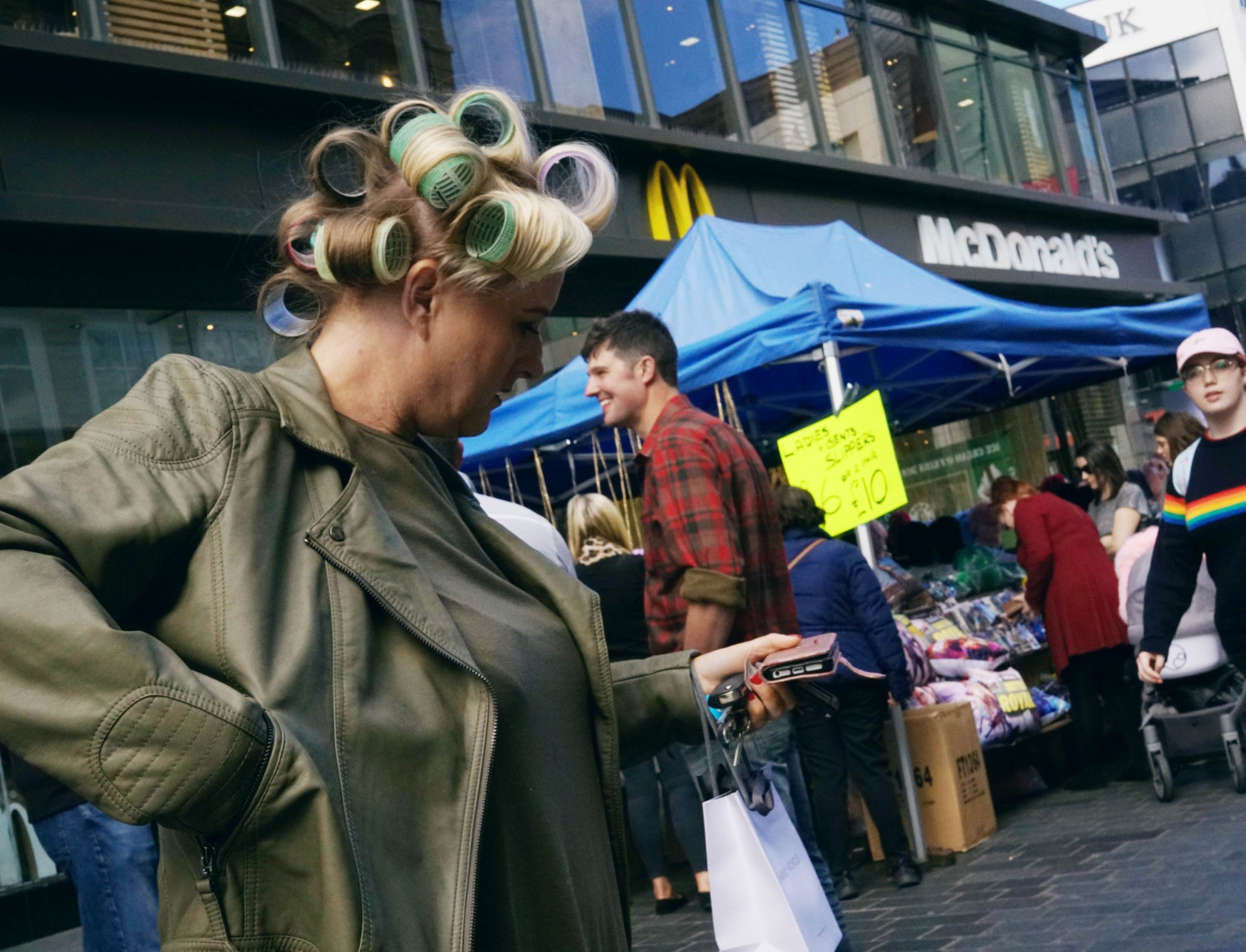 woman with rollers in her hair