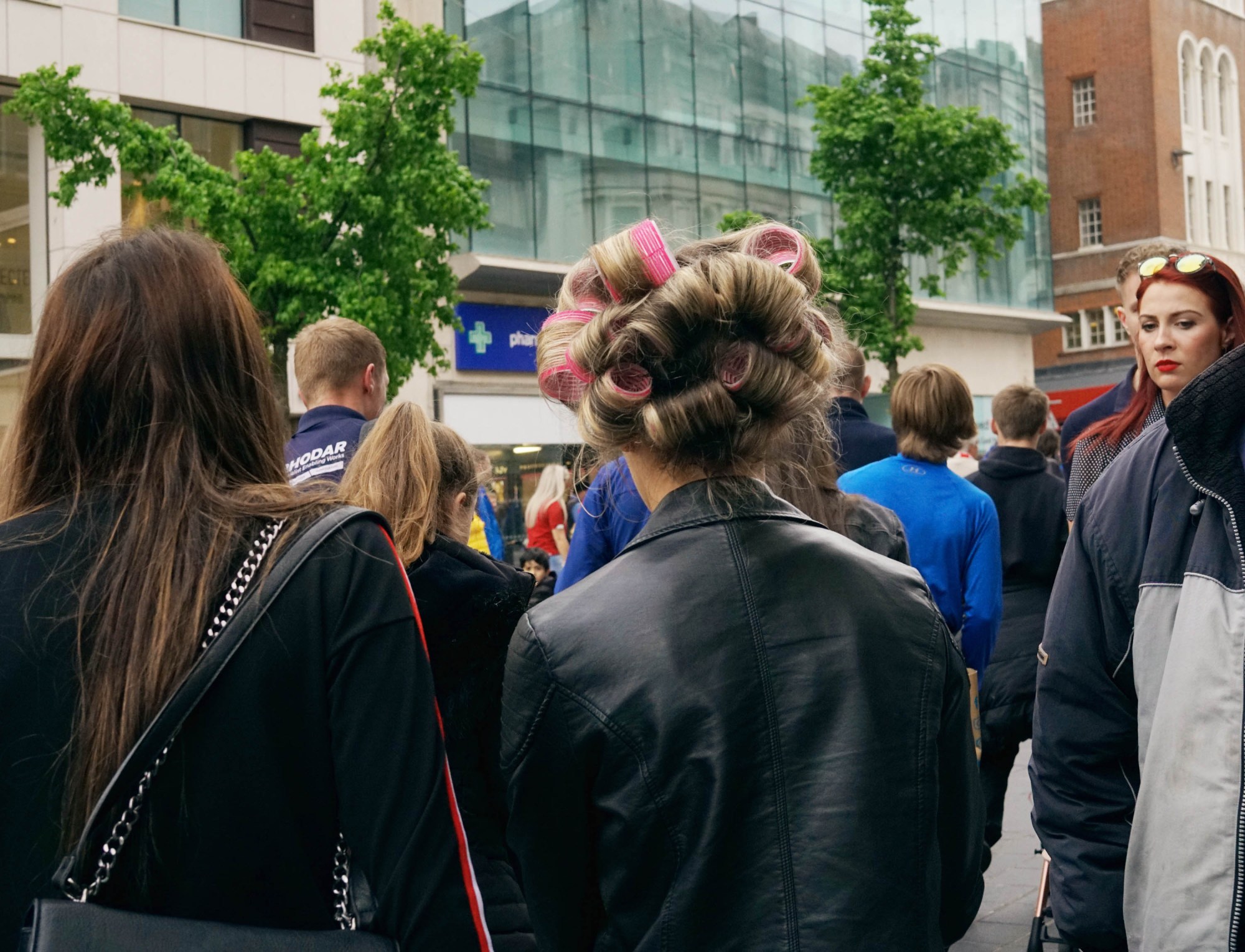 woman with rollers in her hair