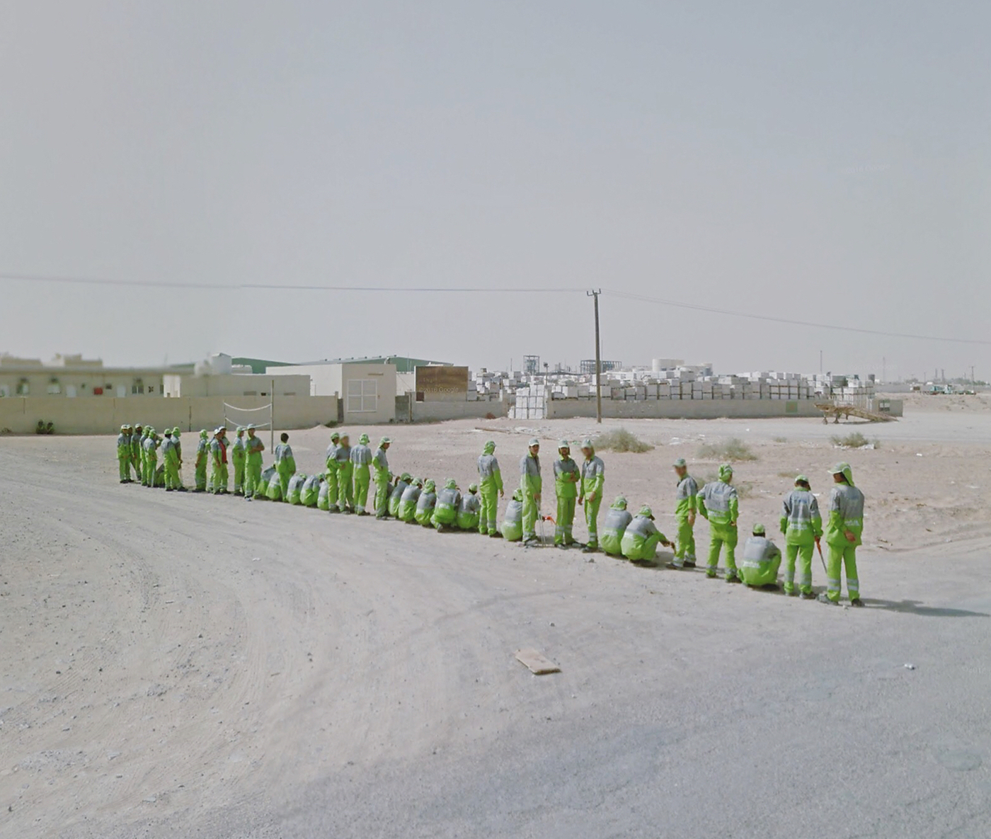 1589282716157-Workers-in-Green_UAE