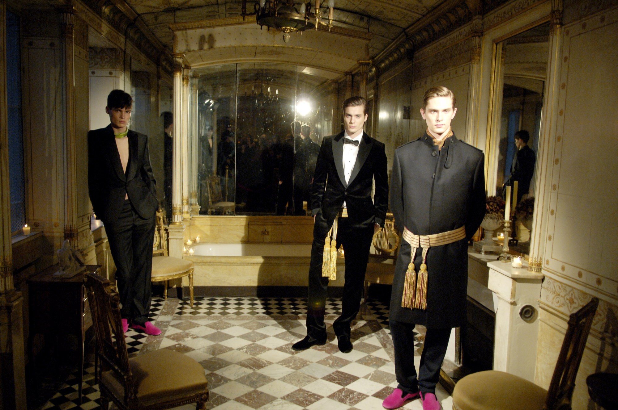 An AW2007 G&H vignette set in the bathroom of Petit Hôtel Bourienne featuring three models in evening wear.