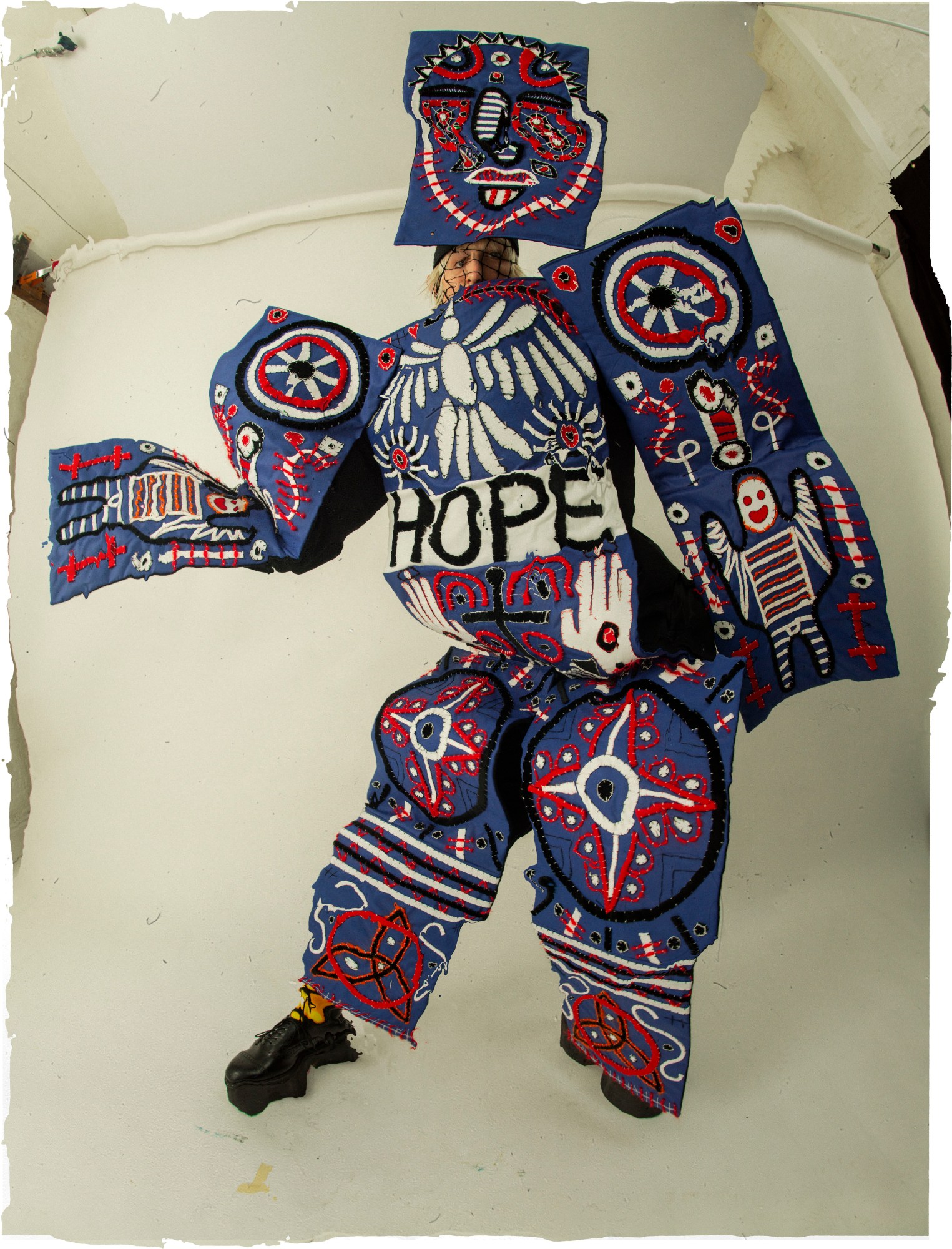 A model in Charles Jeffrey Loverboy SS21 zine 'The Healing' shot by Tim Walker