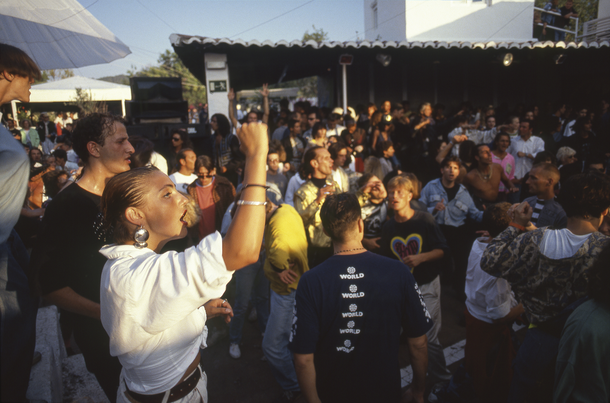 Ibiza 89 Amnesia Pete Heller (at left in black T-shirt) and Portia Bishop (white shirt) greet the sunrise