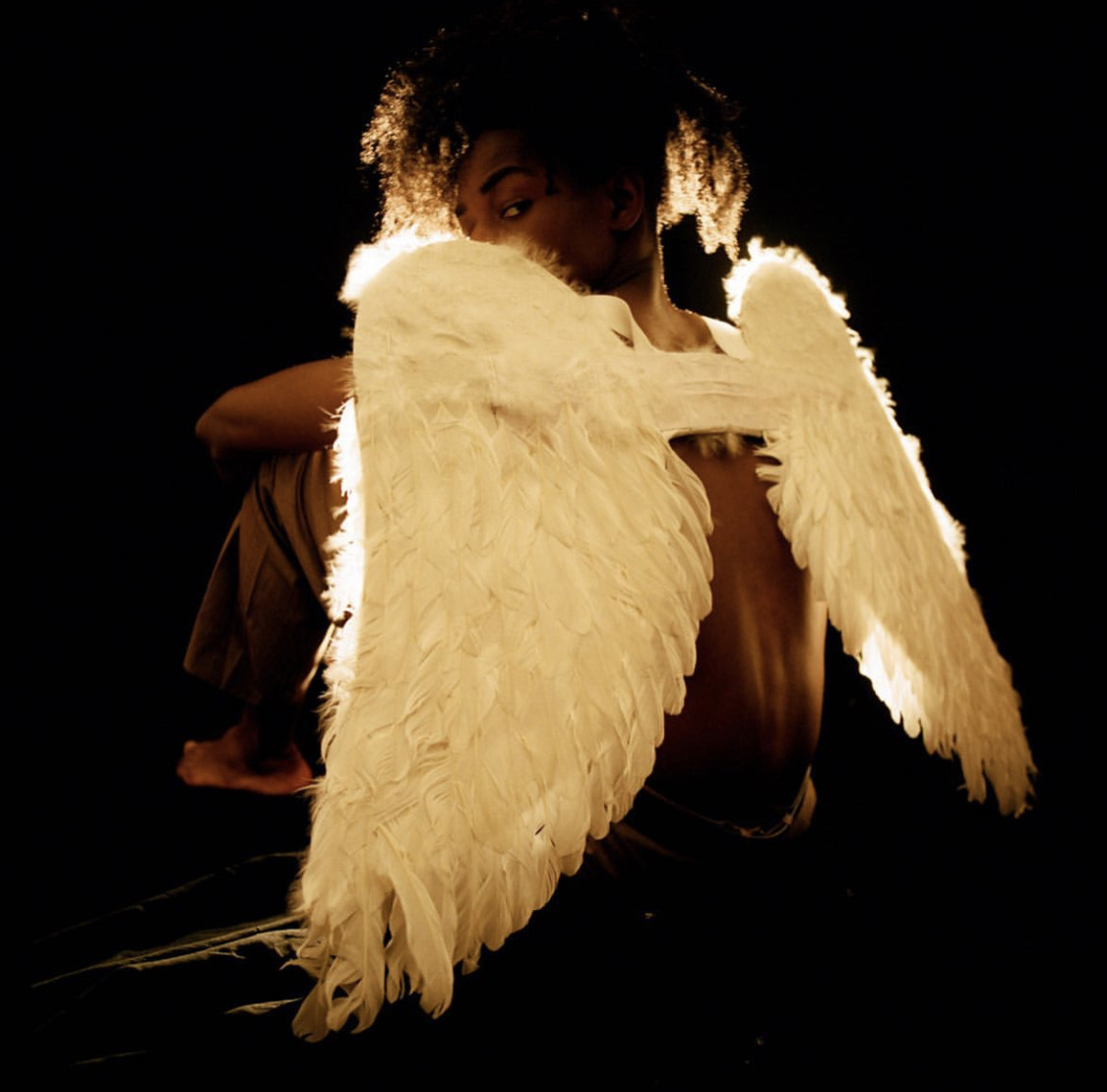 a boy with angel wings