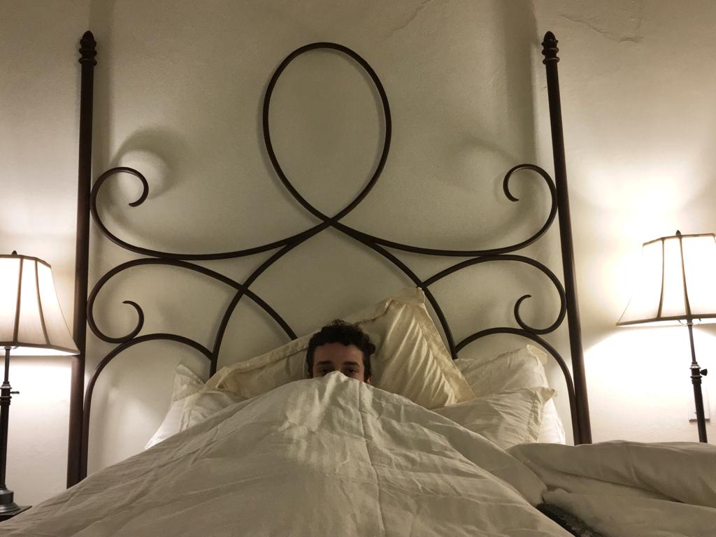 man lying in bed