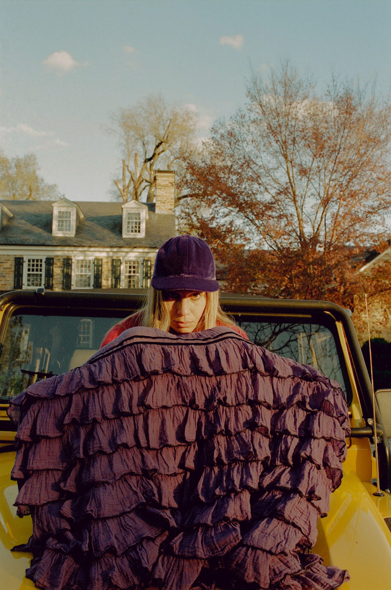 a woman sat on a car bonnet by Karl-hens Pompilius