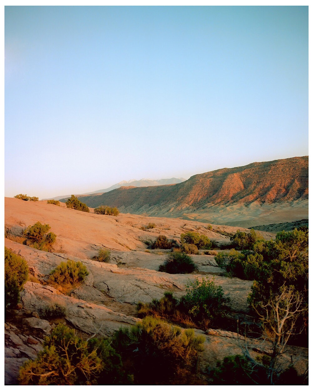 a dramatic landscape as the sun sets by Karl-hens Pompilius