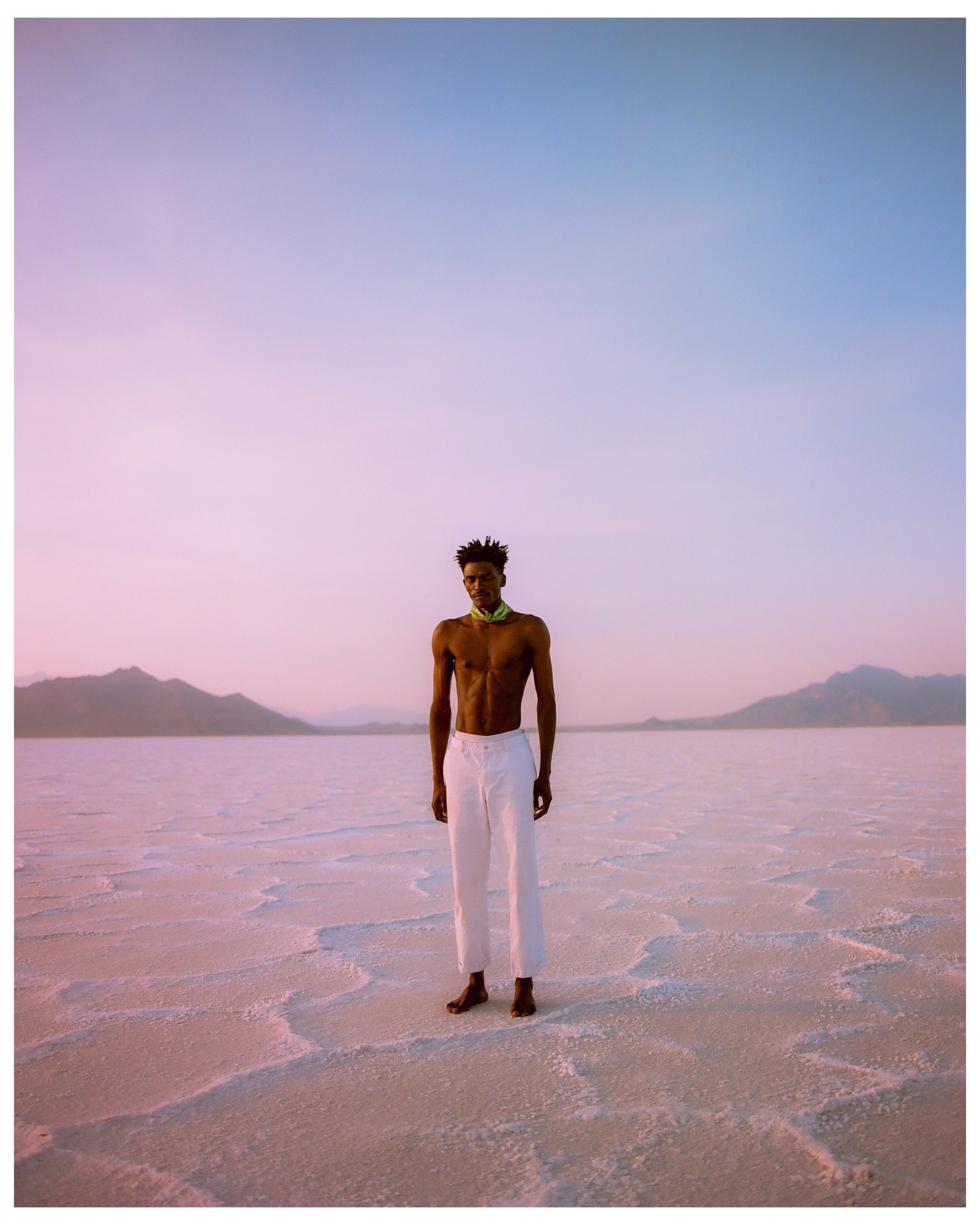 a man standing on a salt plain by Karl-hens Pompilius