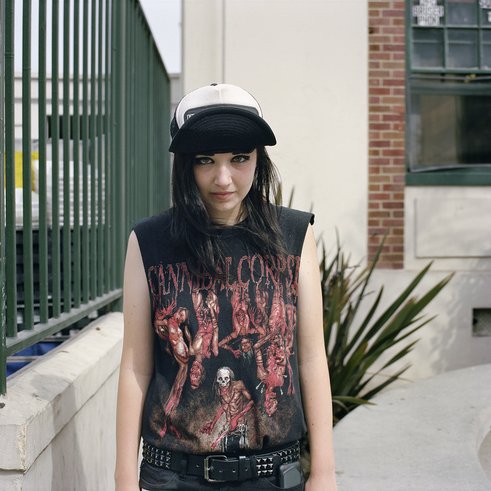 a woman wearing a cannibal corpse t-shirt by deanna templeton