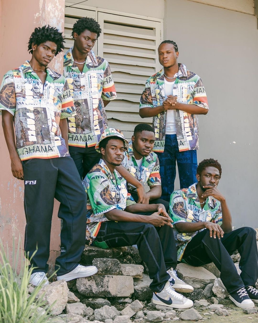 a group wearing free the youth streetwear