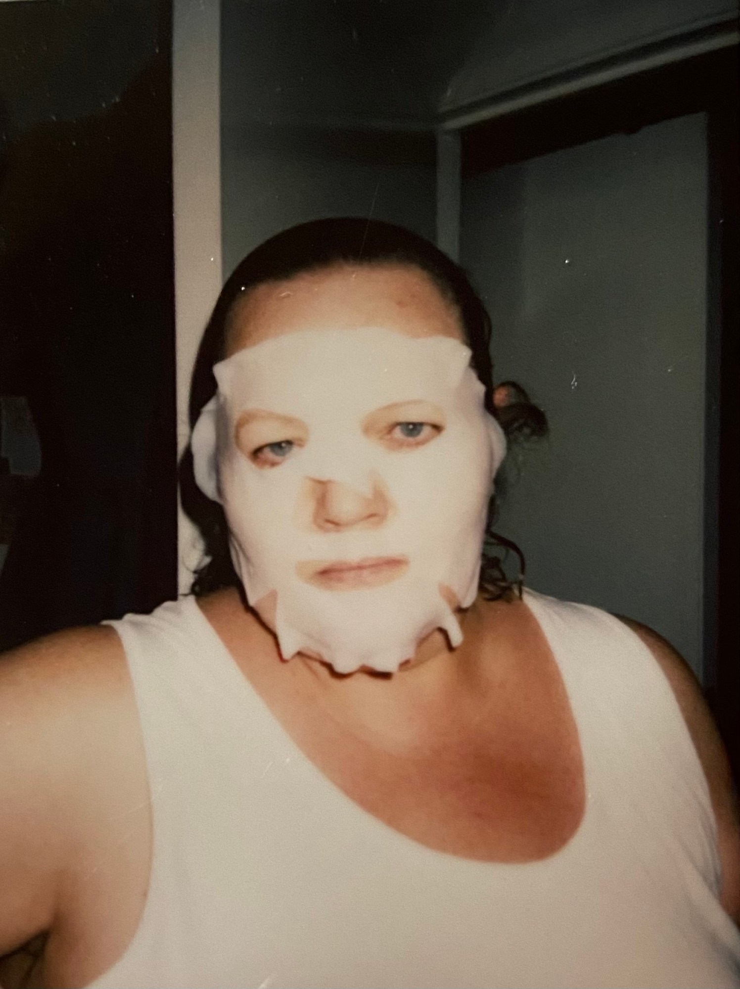 a woman in a face mask