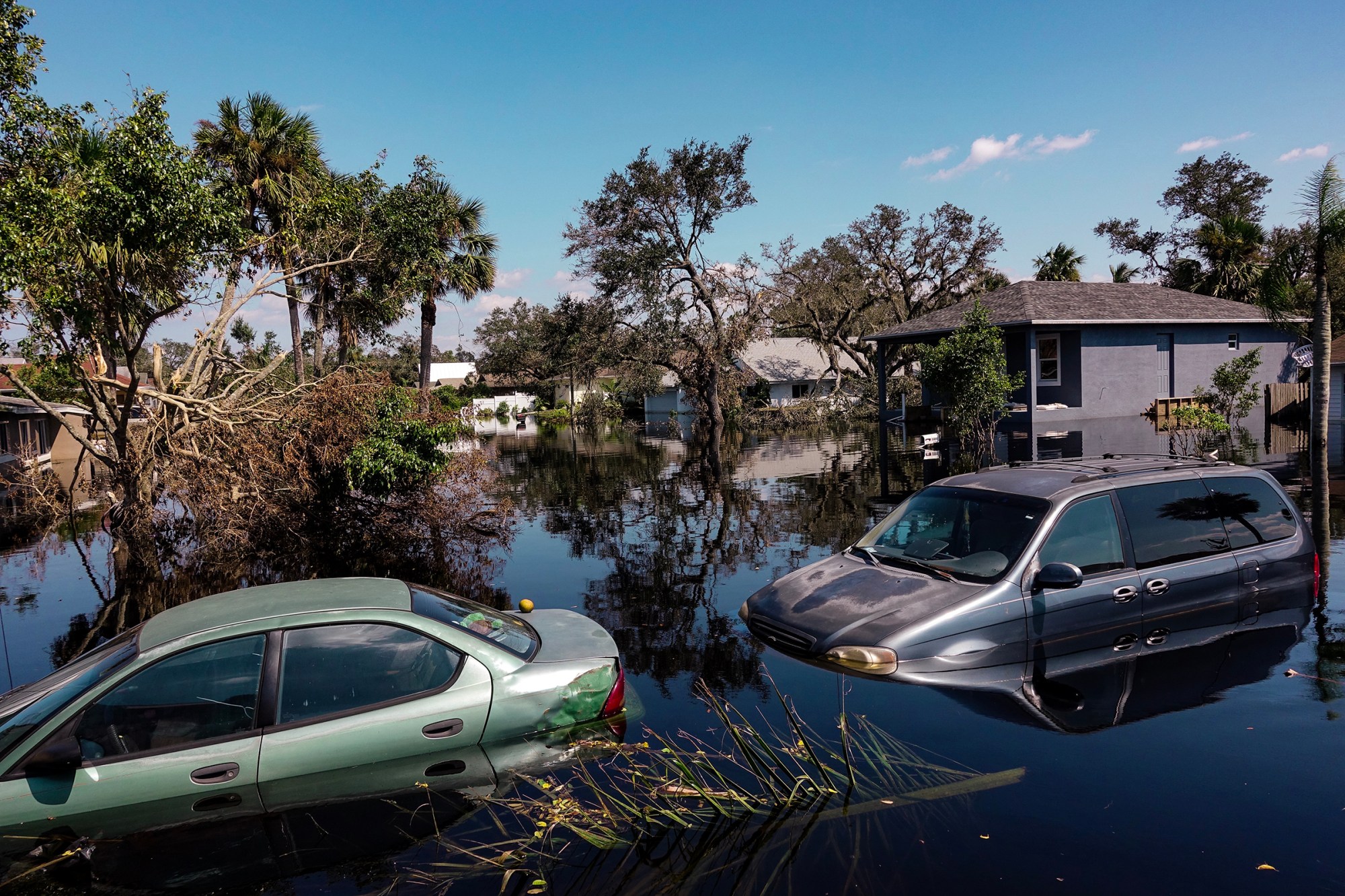 cars submerged in flooding in Robert LeBlanc A New America