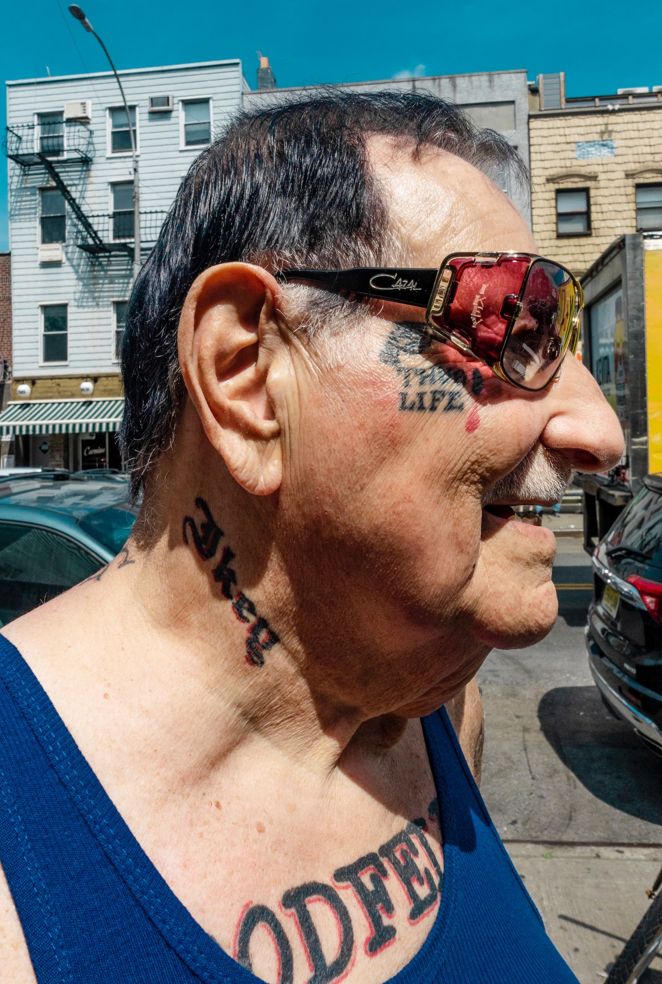 old man with tattoos and sunglasses in Robert LeBlanc A New America