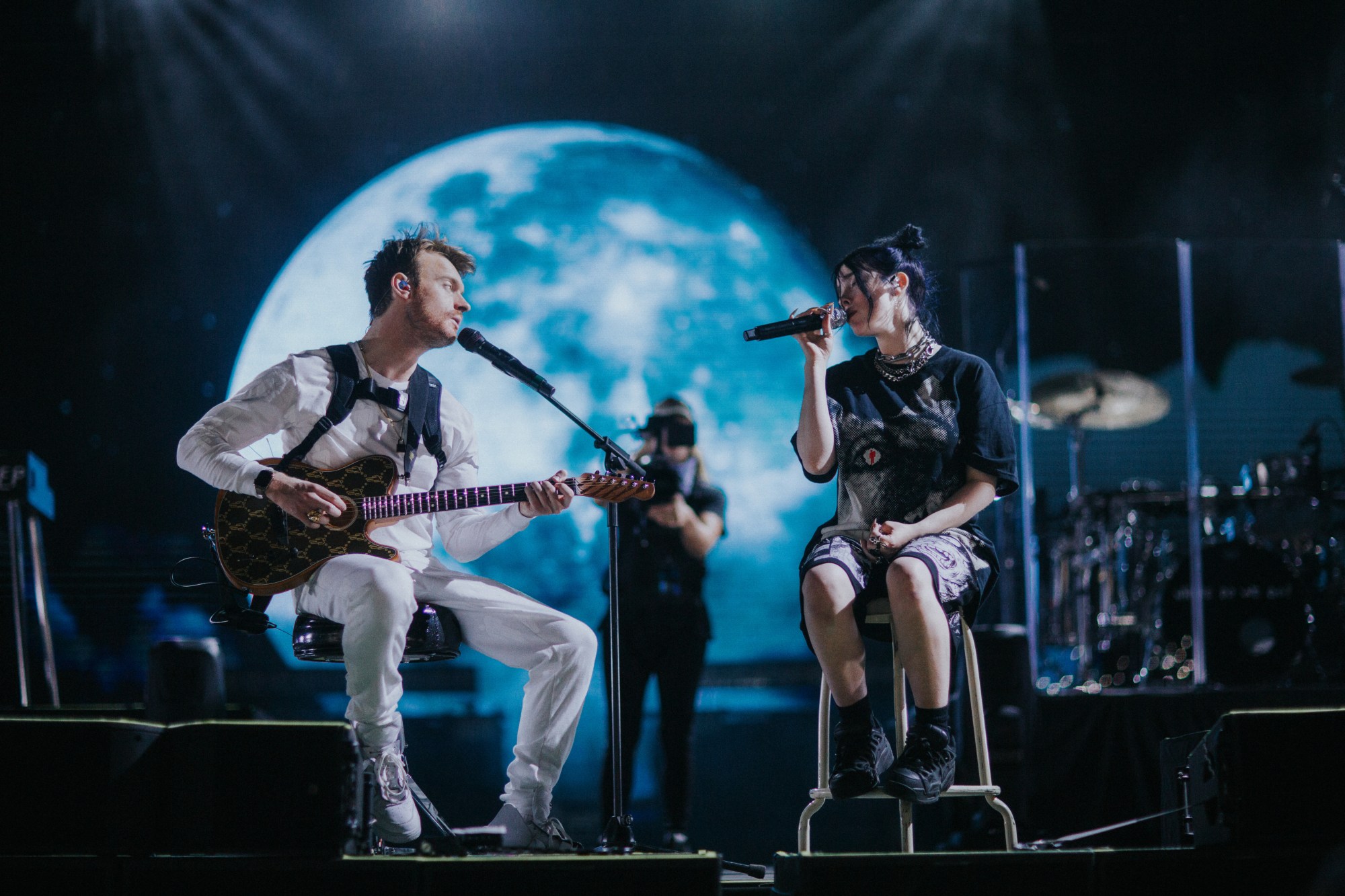 Billie_Eilish and Finneas on stage in The World's A Little Blurry