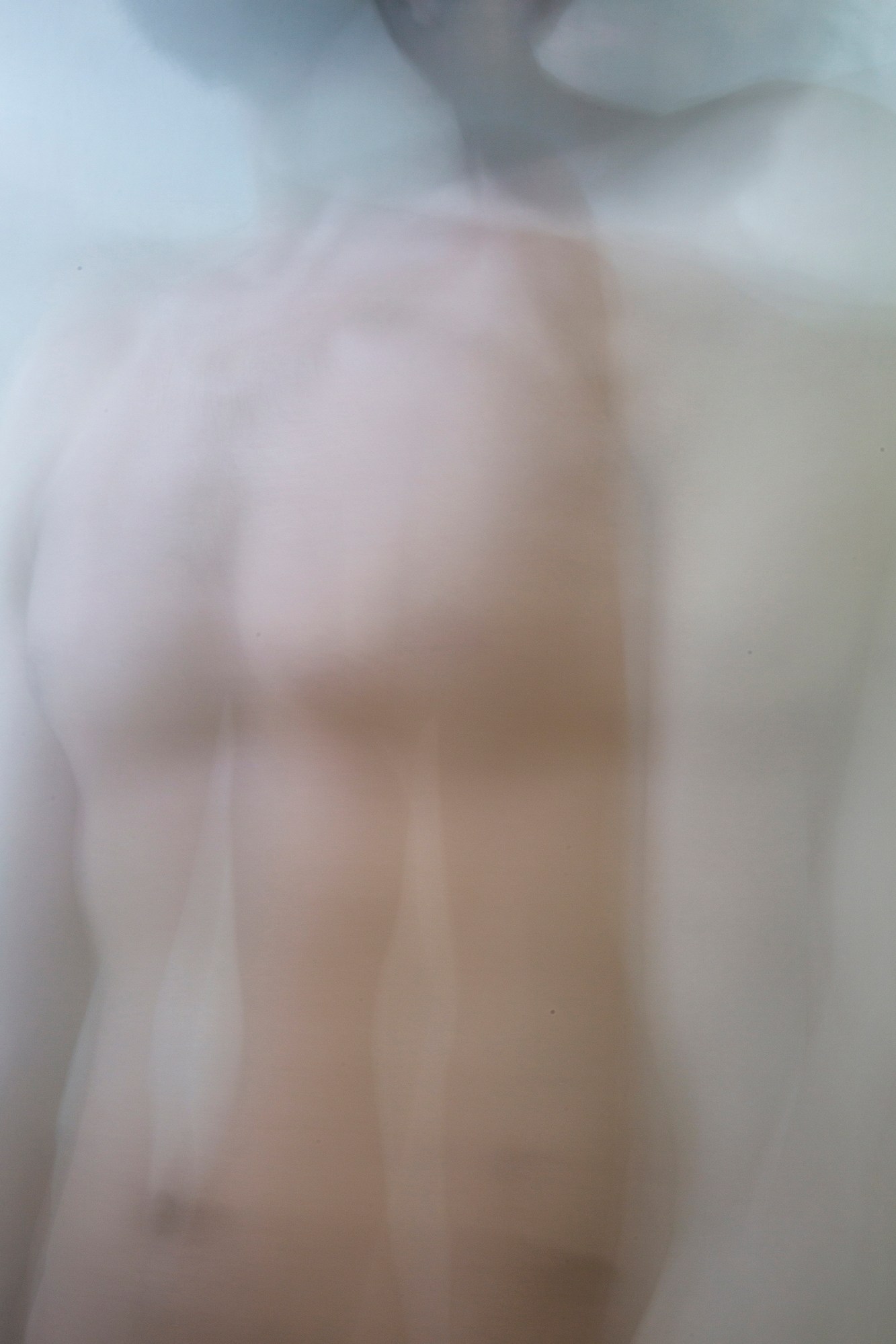 a topless man self-portrait